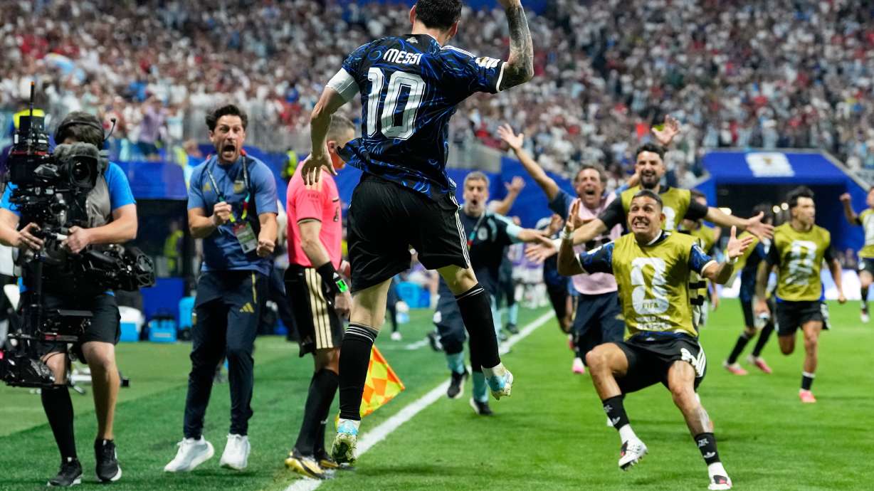 Argentina's Lionel Messi celebrates after teammate Lautaro Martinez scored their side's second goal during the World Cup semifinal soccer match between England and Argentina in Atlanta, Wednesday, July 15, 2026.