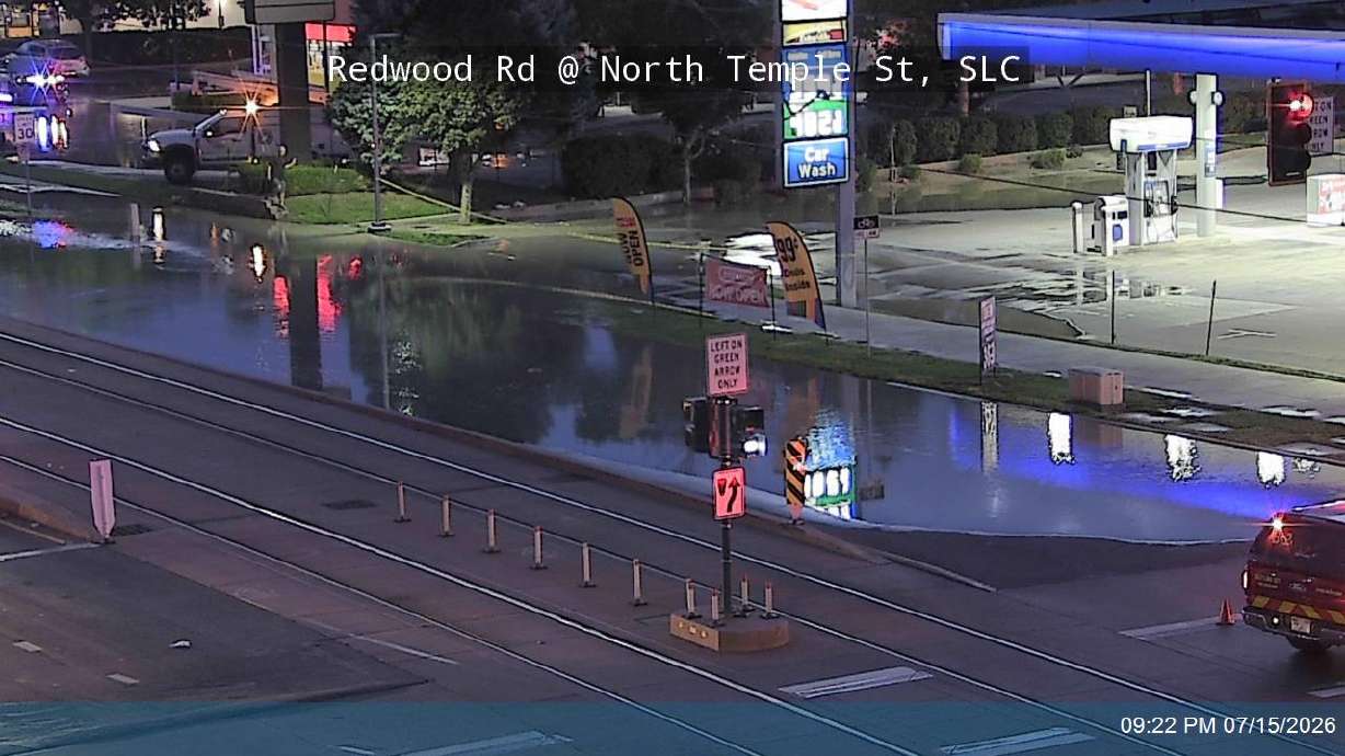 Standing water is seen on North Temple in Salt Lake City on Wednesday. A section of North Temple was closed after a main waterline break caused flooding.