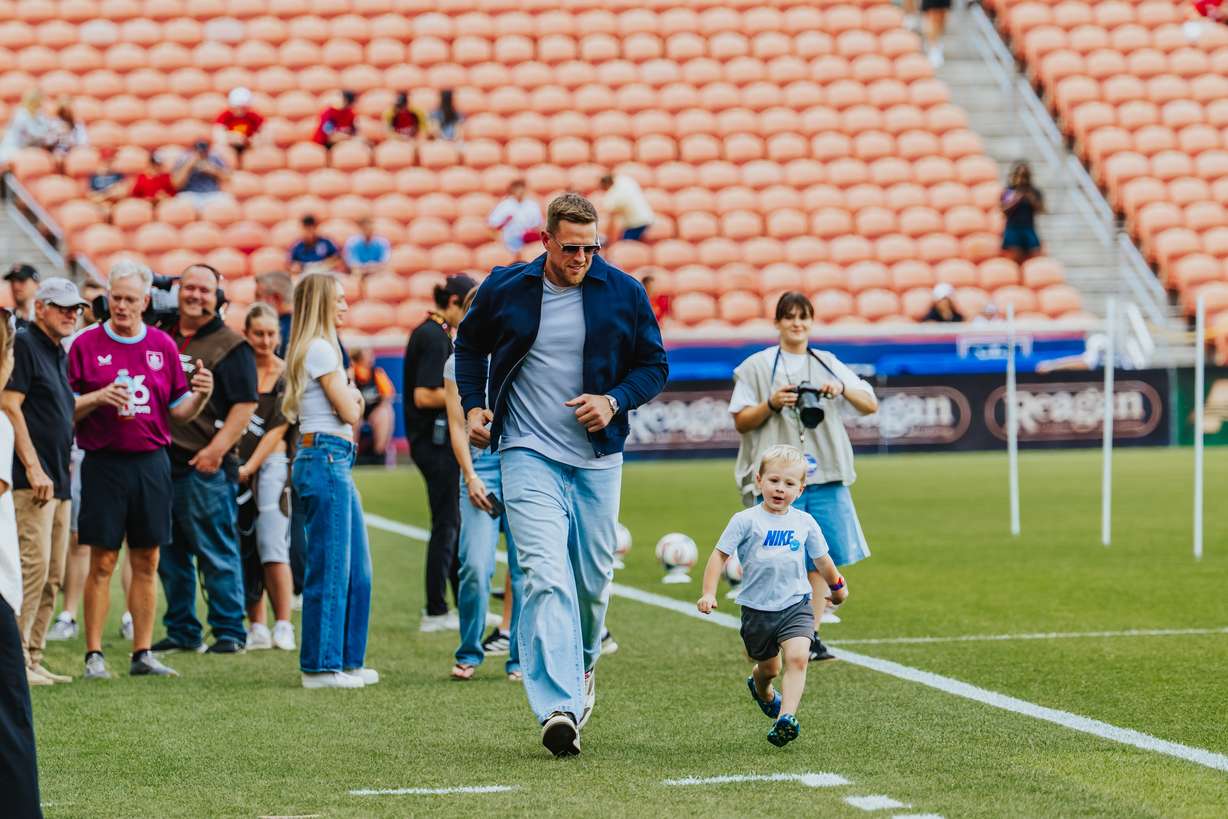 Former NFL star and Burnley FC investor J.J. Watt plays with his children before Real Salt Lake's 4-1 win over Burnley FC in an international friendly, Wednesday, July 15, 2026 at America First Field in Sandy, Utah.