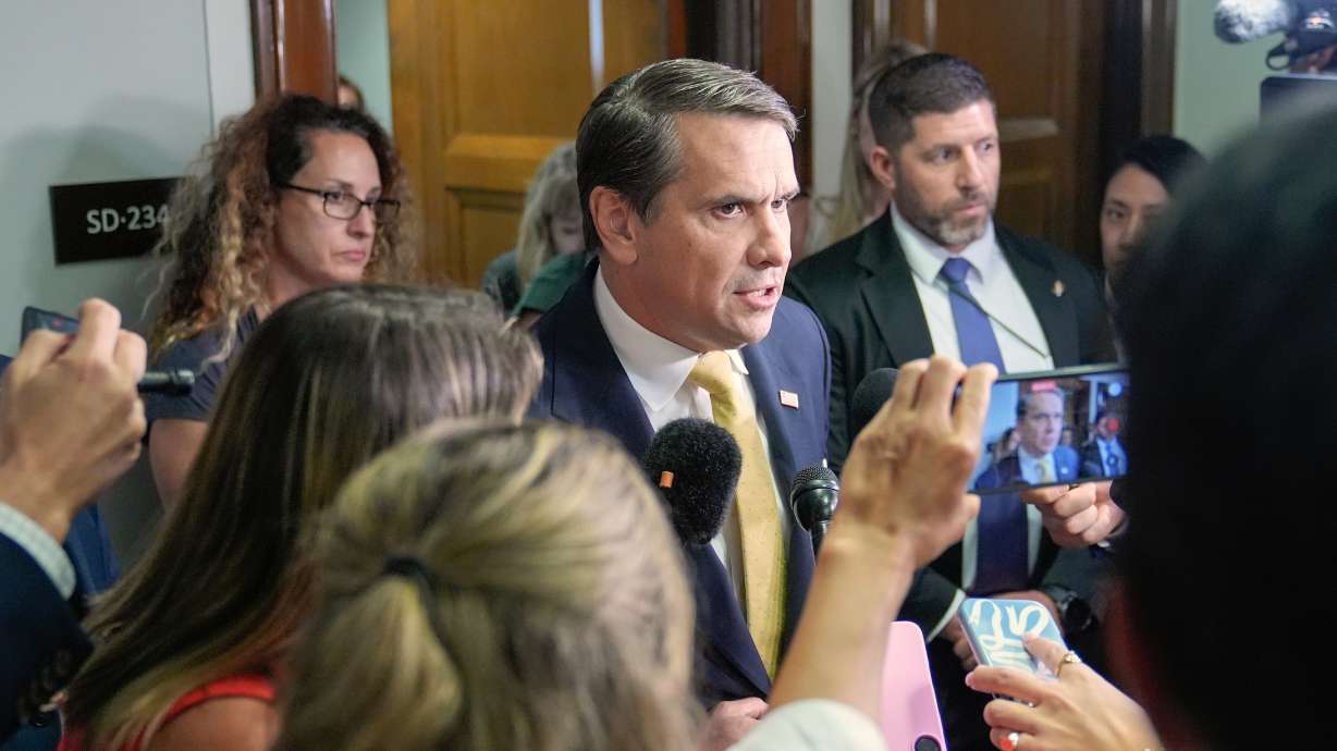 Acting Attorney General Todd Blanche talks with reporters after attending a meeting related to survivors of convicted sex offender Jeffrey Epstein, in Washington, July 16. Utah Sen. John Curtis said on Tuesday he would vote to confirm Blanche.