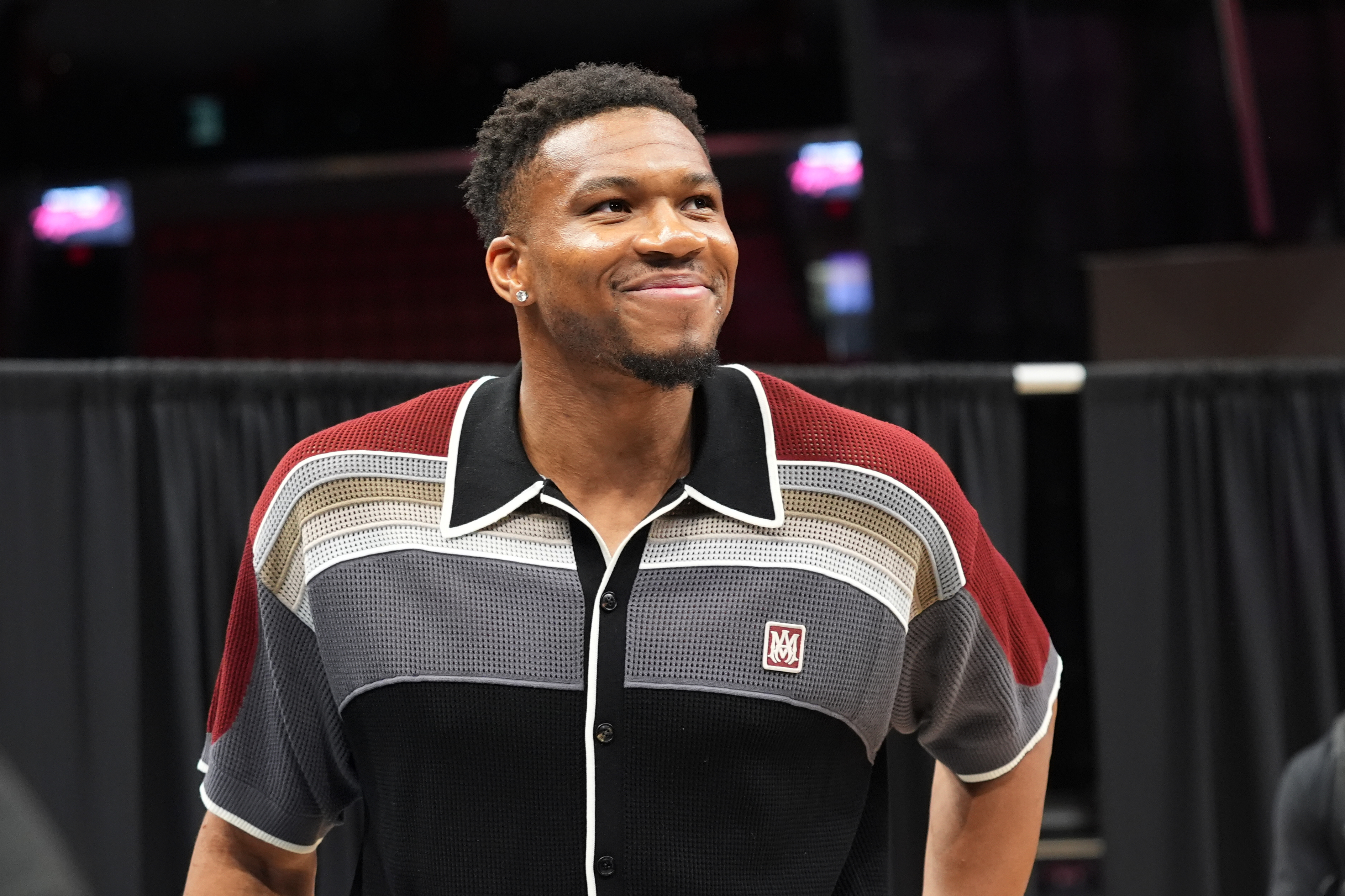 Giannis Antetokounmpo smiles after a news conference where he was introduced as a new Miami Heat player Thursday, July 16, 2026, in Miami. 