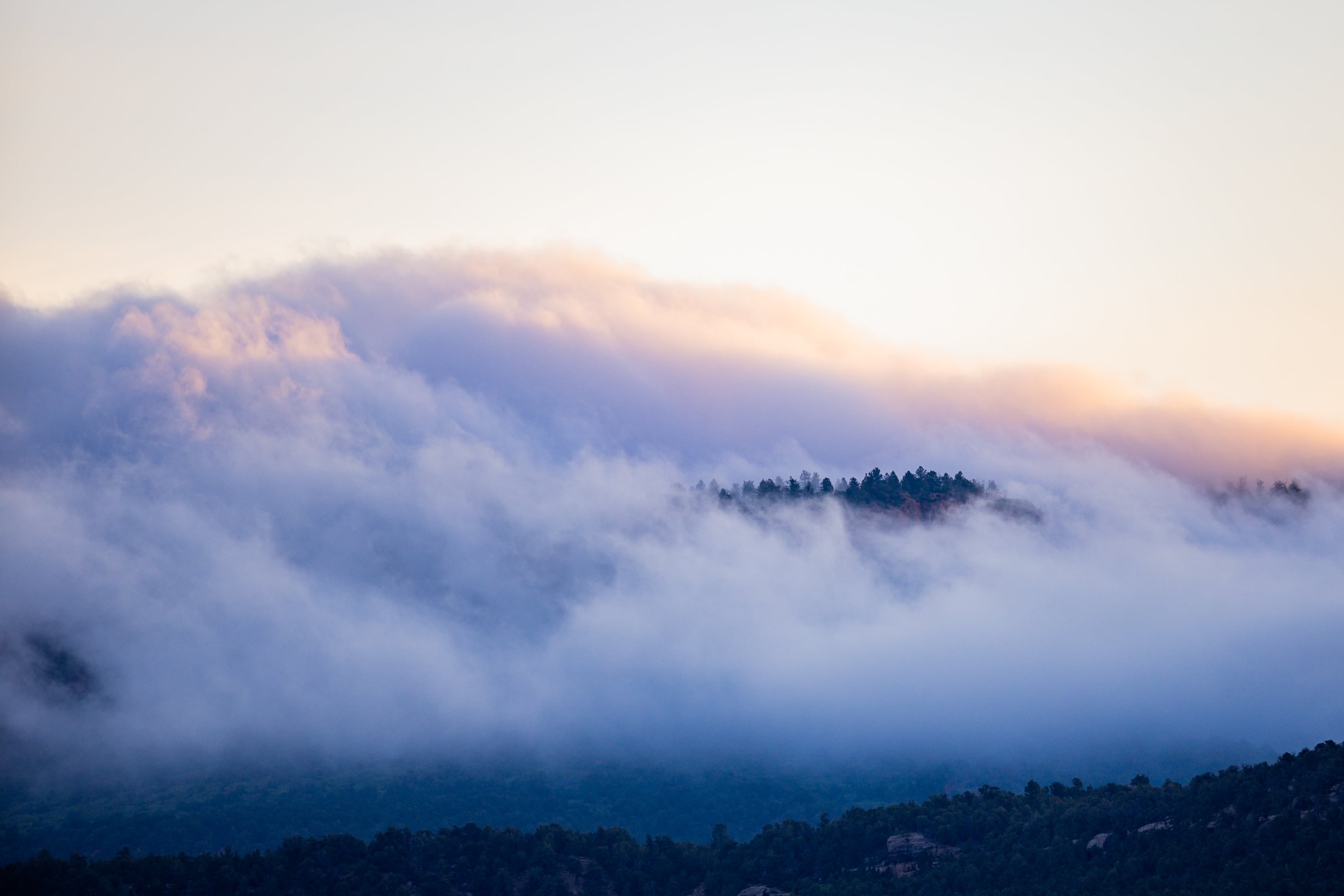 Fog envelops the Bears Ears buttes at sunrise at Bears Ears National Monument on June 4, 2025. Shrinking monuments are not as potentially damaging as some people think, according to experts.