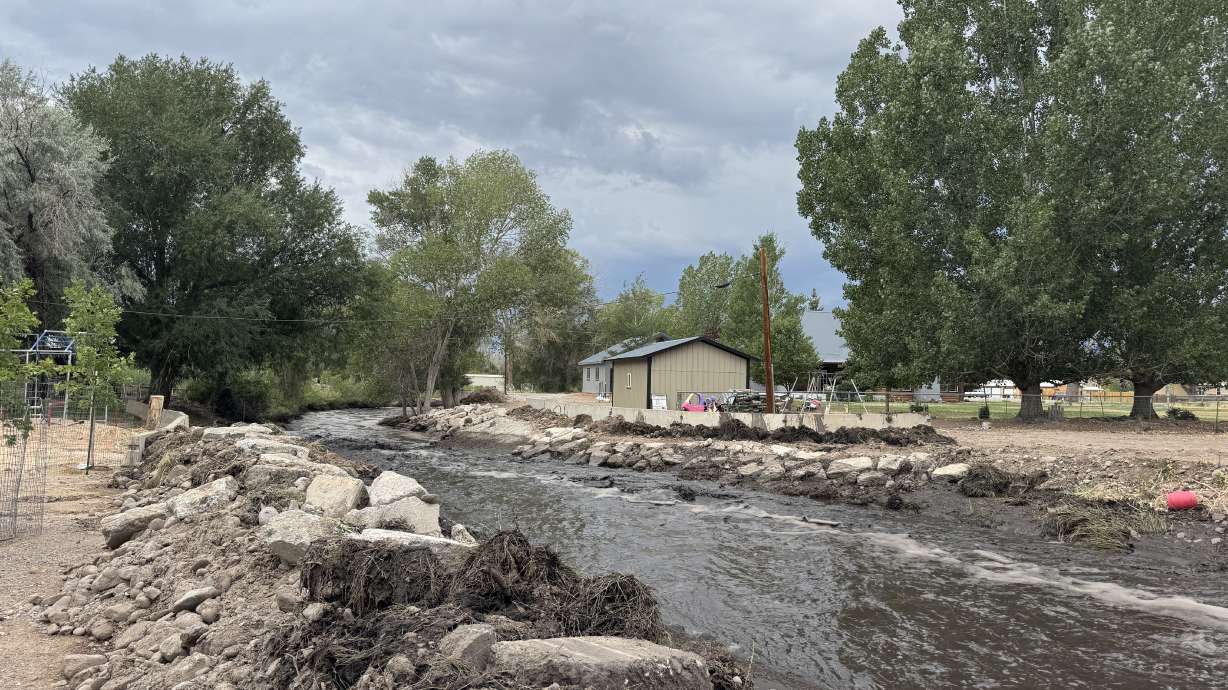 Beaver River on Thursday as debris flow from Cottonwood Fire burn scar began to wane. Neighbors and community leaders alike were watching the skies cautiously amid ongoing thunderstorm potential and flash flood risk.