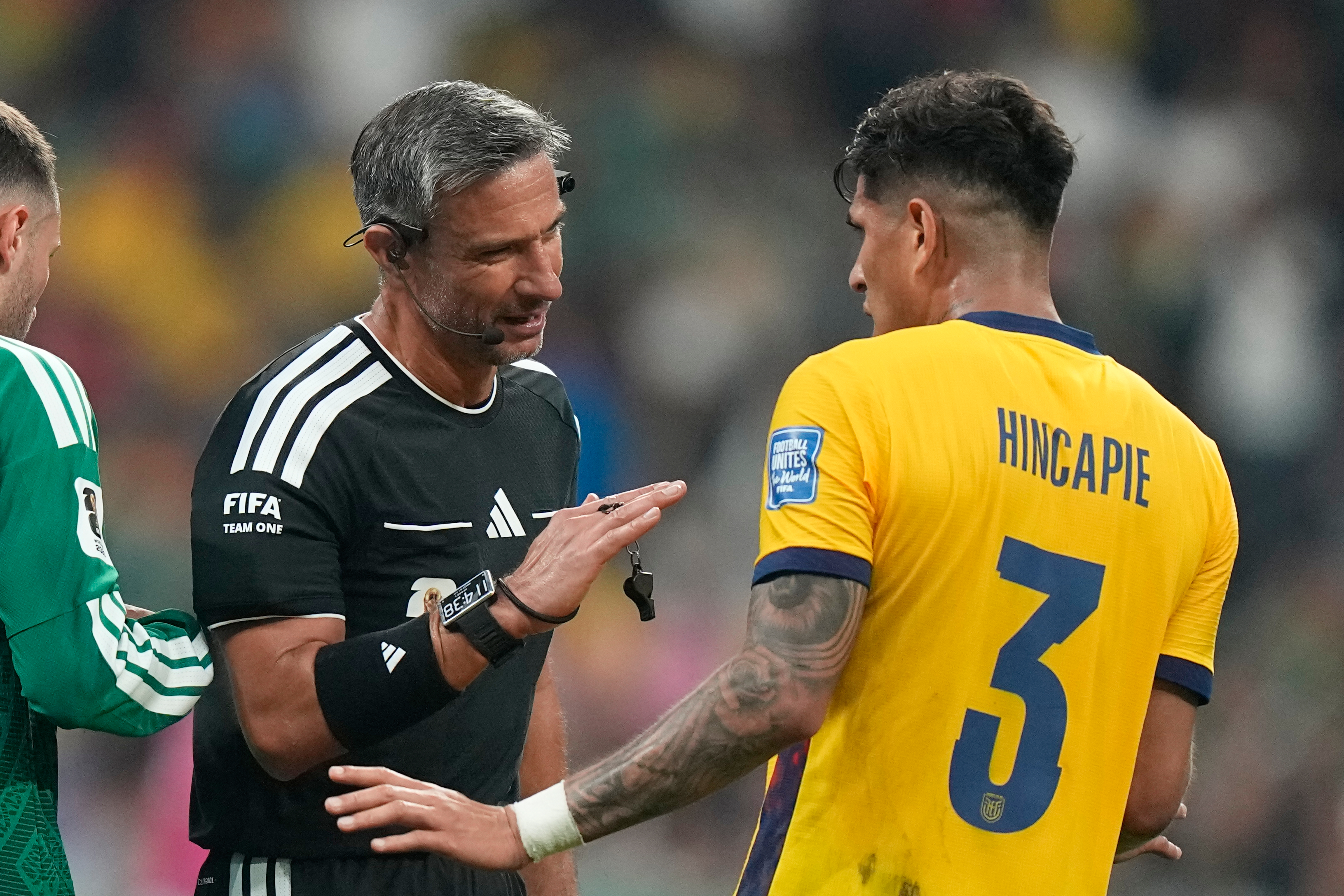 Referee Slavko Vincic, of Slovenia, talks to Ecuador's Piero Hincapie (3) during the World Cup round of 32 soccer match between Mexico and Ecuador in Mexico City, Tuesday, June 30, 2026. 