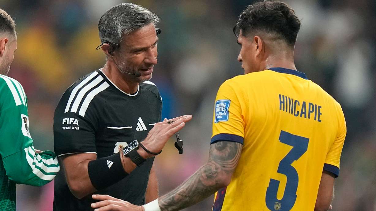 Referee Slavko Vincic, of Slovenia, talks to Ecuador's Piero Hincapie (3) during the World Cup round of 32 soccer match between Mexico and Ecuador in Mexico City, Tuesday, June 30, 2026.