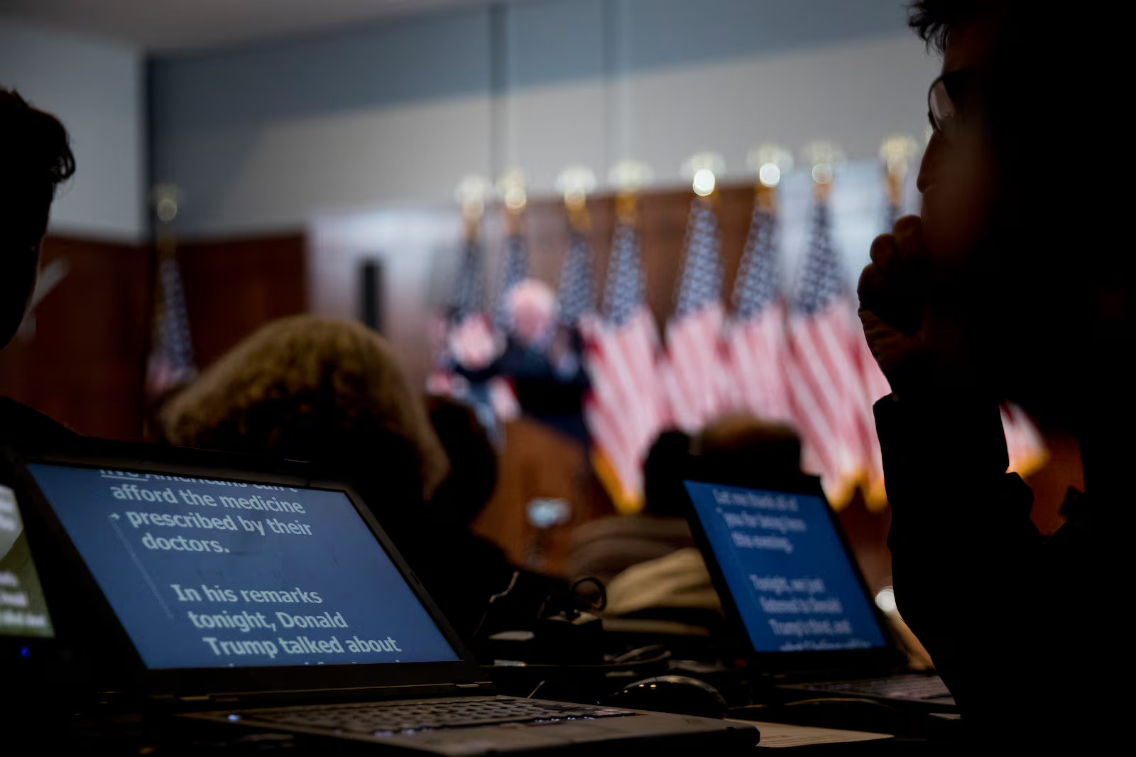 A man runs the teleprompter for then-Democratic presidential candidate Sen. Bernie Sanders, I-Vt., as Sanders delivers his response to President Donald Trump's State of the Union at The Currier Museum of Art, Feb. 4, 2020, in Manchester, N.H.