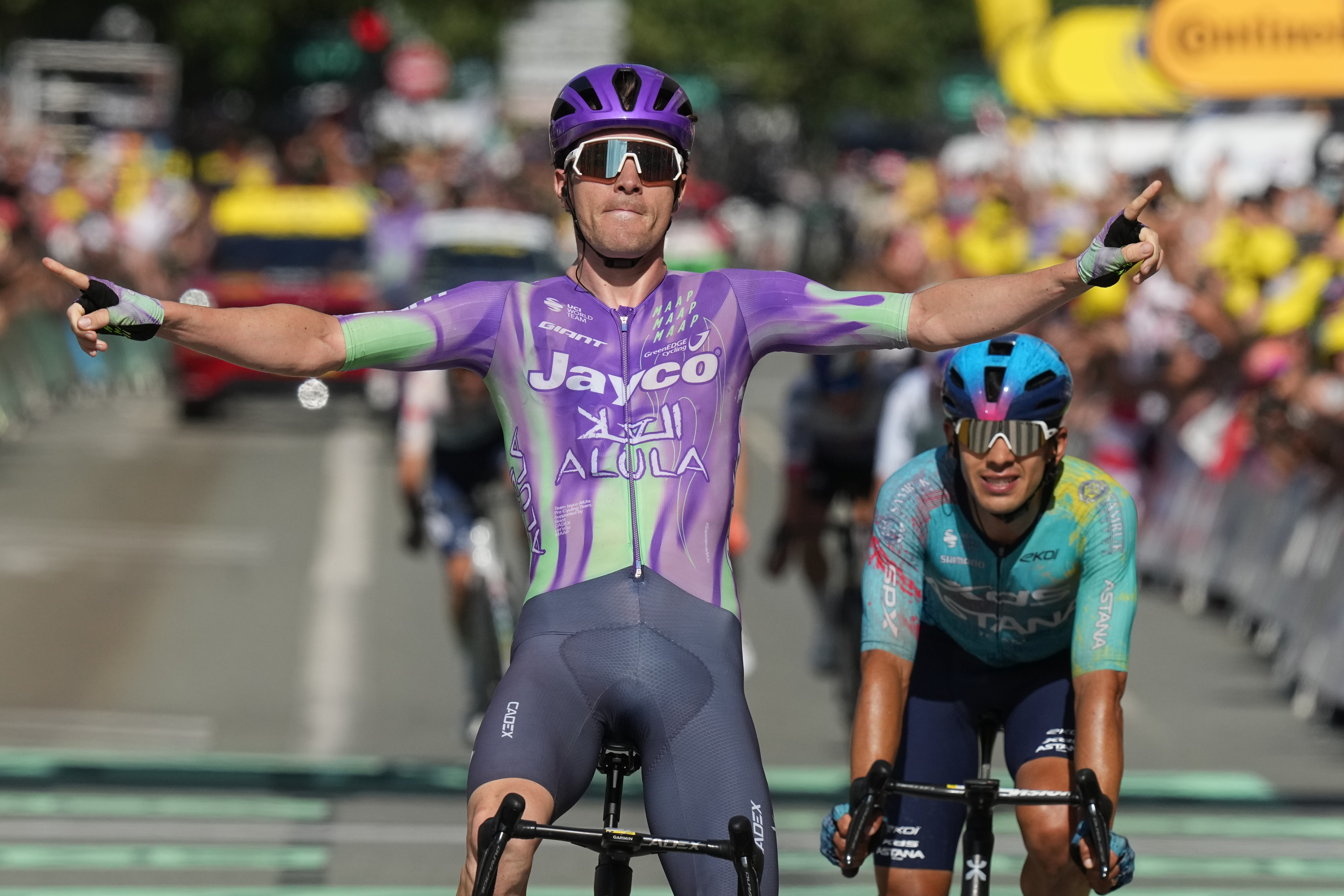 Schmid wins long 13th stage of the Tour and Pogacar safely keeps overall lead