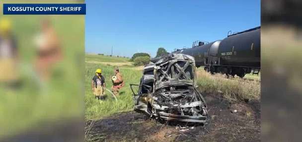 Man pulls teenage brothers from burning car after train crash
