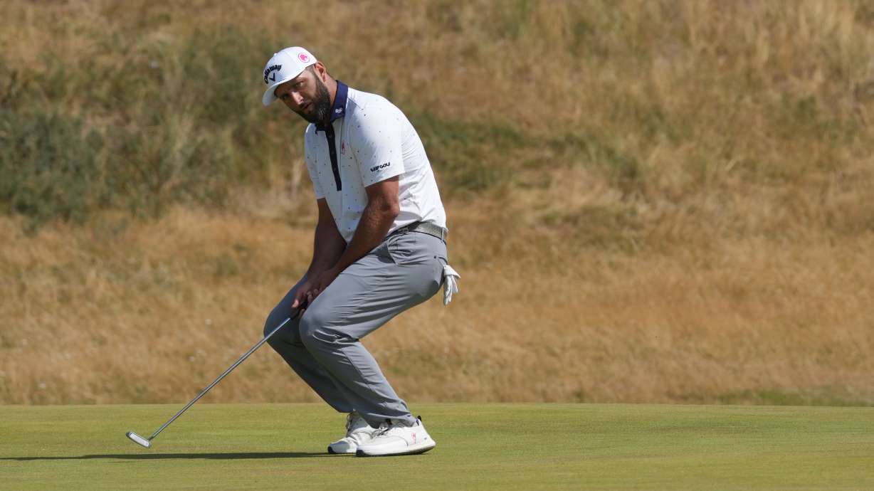 Jon Rahm of Spain reacts after putting on the 6th green during the first day of the British Open Golf championships at Royal Birkdale golf club, in Southport, England, Thursday, July 16, 2026.