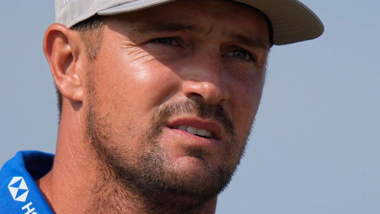 Bryson DeChambeau of the United States walks off the 9th tee during the second day of the British Open Golf championships at Royal Birkdale golf club, in Southport, England, Friday, July 17, 2026.