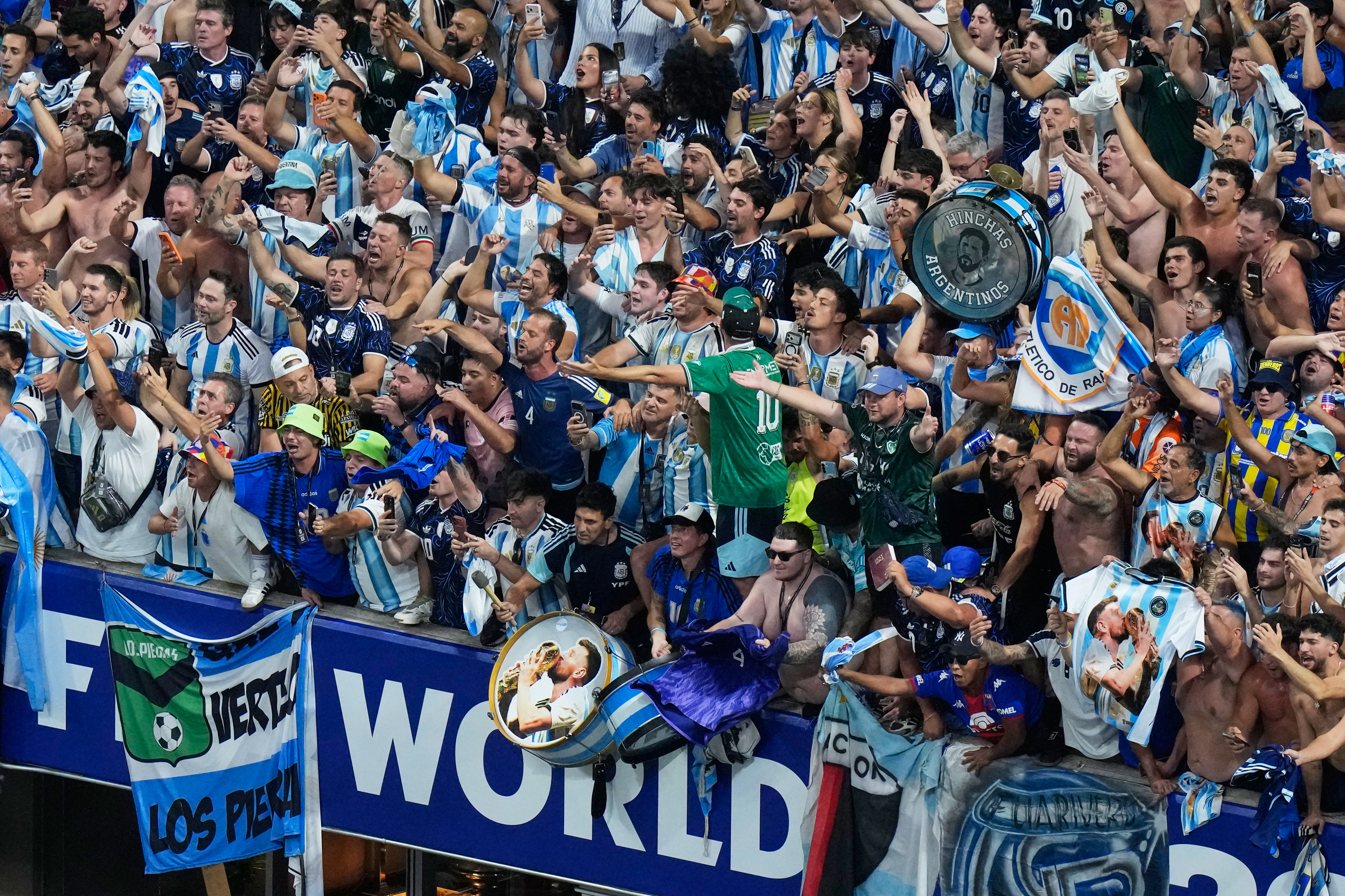 Fans of Argentina celebrate after they defeated England in their World Cup semifinal soccer match in Atlanta, Wednesday, July 15, 2026. 