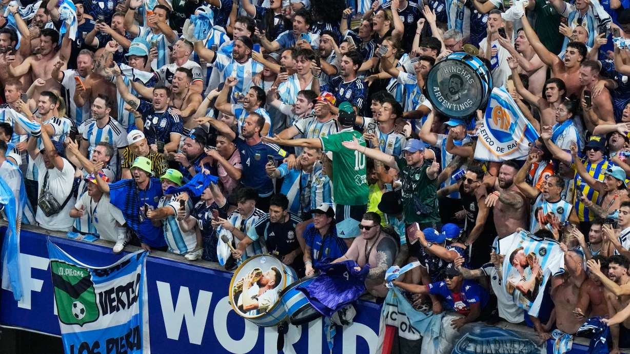 Fans of Argentina celebrate after they defeated England in their World Cup semifinal soccer match in Atlanta, Wednesday, July 15, 2026.