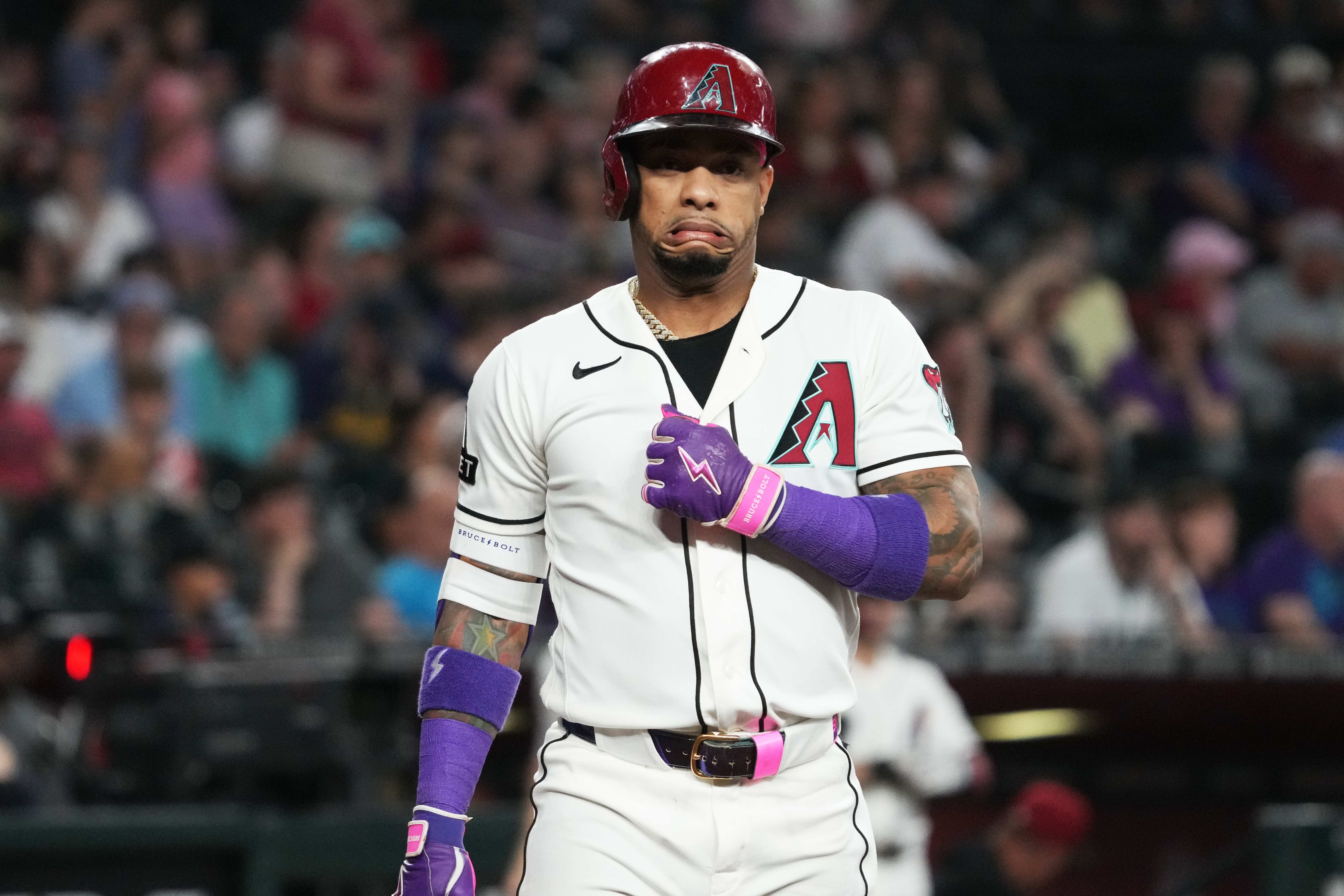 Arizona Diamondbacks' Ketel Marte reacts after a wild pitch in the first inning of a baseball game against the Milwaukee Brewers, Sunday, July 5, 2026, in Phoenix. 