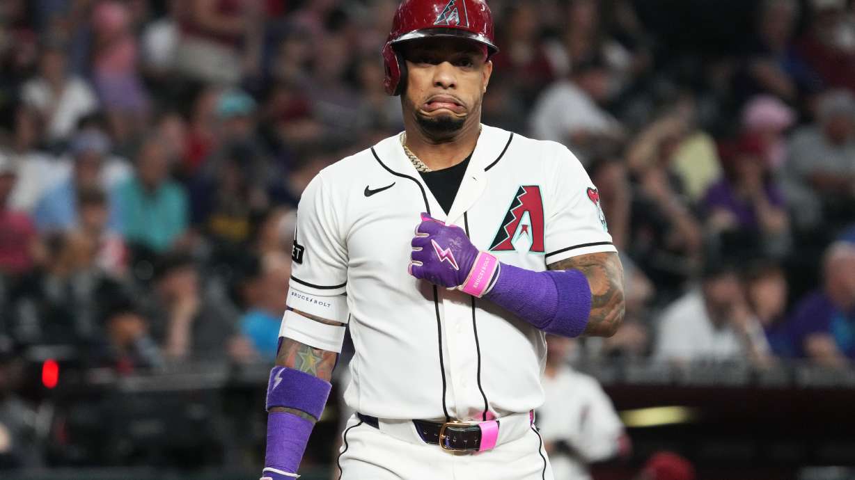 Arizona Diamondbacks' Ketel Marte reacts after a wild pitch in the first inning of a baseball game against the Milwaukee Brewers, Sunday, July 5, 2026, in Phoenix.