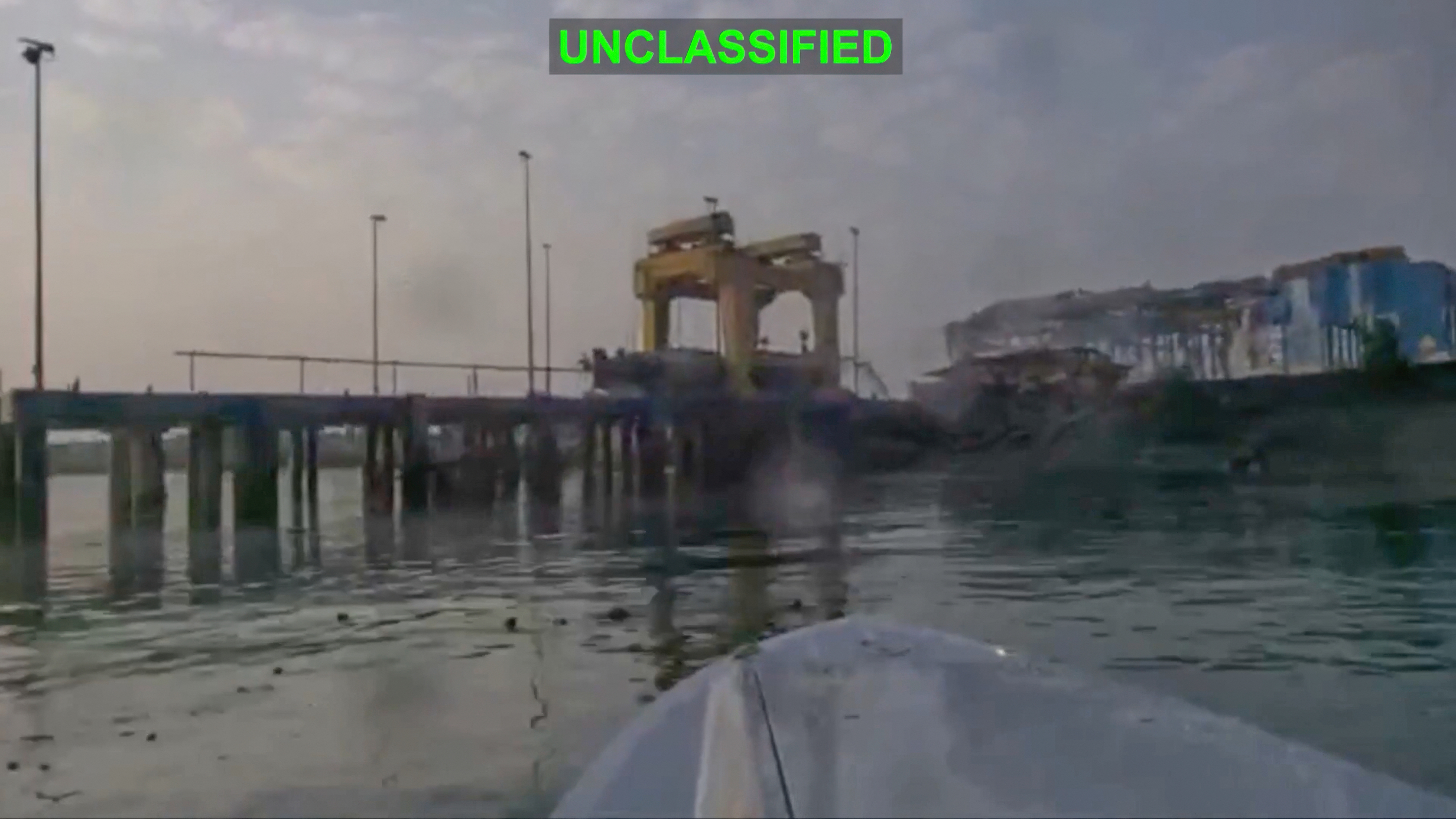 A view from a Corsair unmanned surface vessel, also called one-way attack surface drone, fired by U.S. military, closing in on Bandar Abbas Naval Base, Iran, Monday. Central Command conducted a seventh straight night of strikes on Saturday.