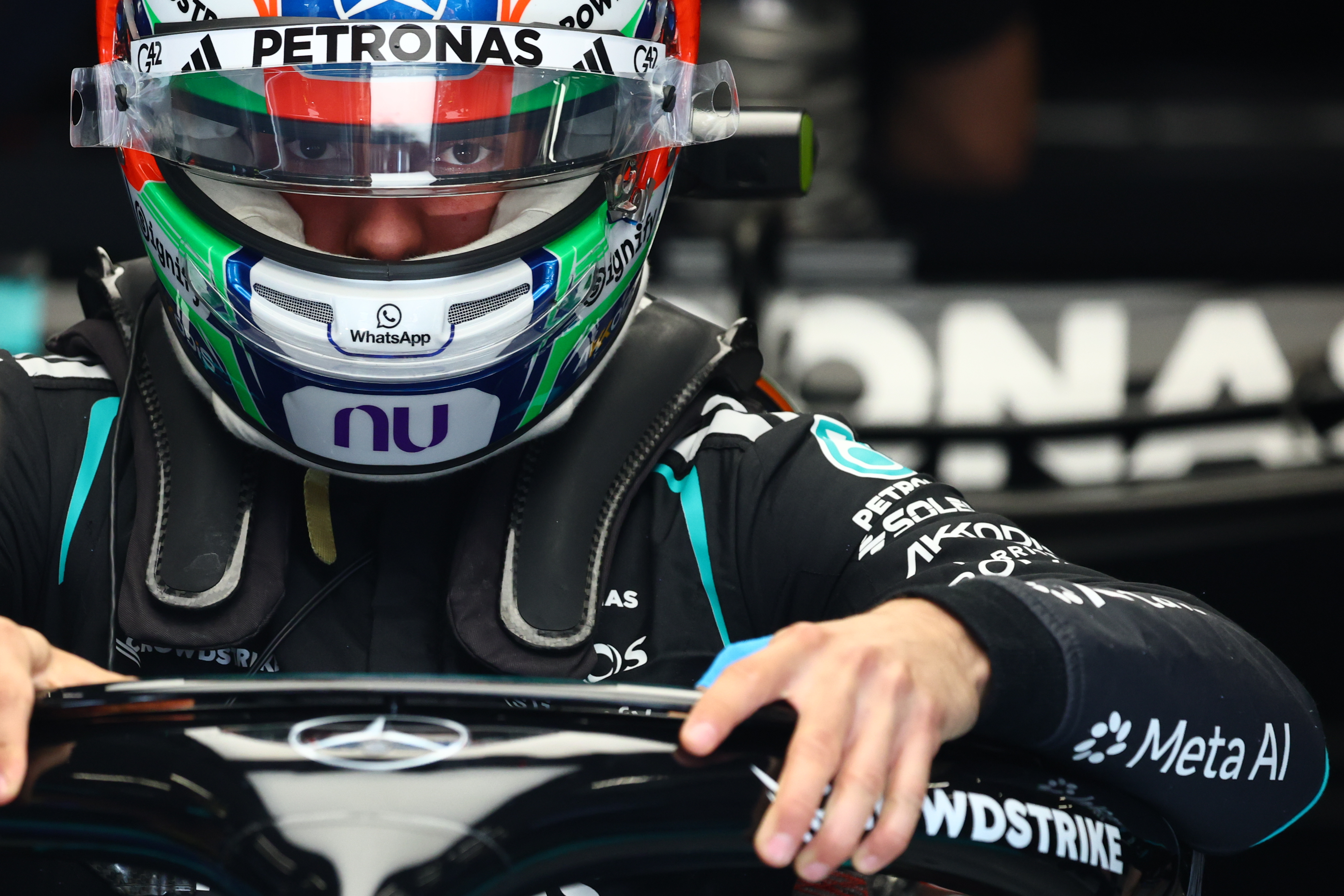 Mercedes driver Andrea Kimi Antonelli of Italy gets into his car as he prepares for the qualifying session ahead of the Formula One Grand Prix at the Spa-Francorchamps racetrack in Spa, Belgium, Saturday, July 18, 2026. 