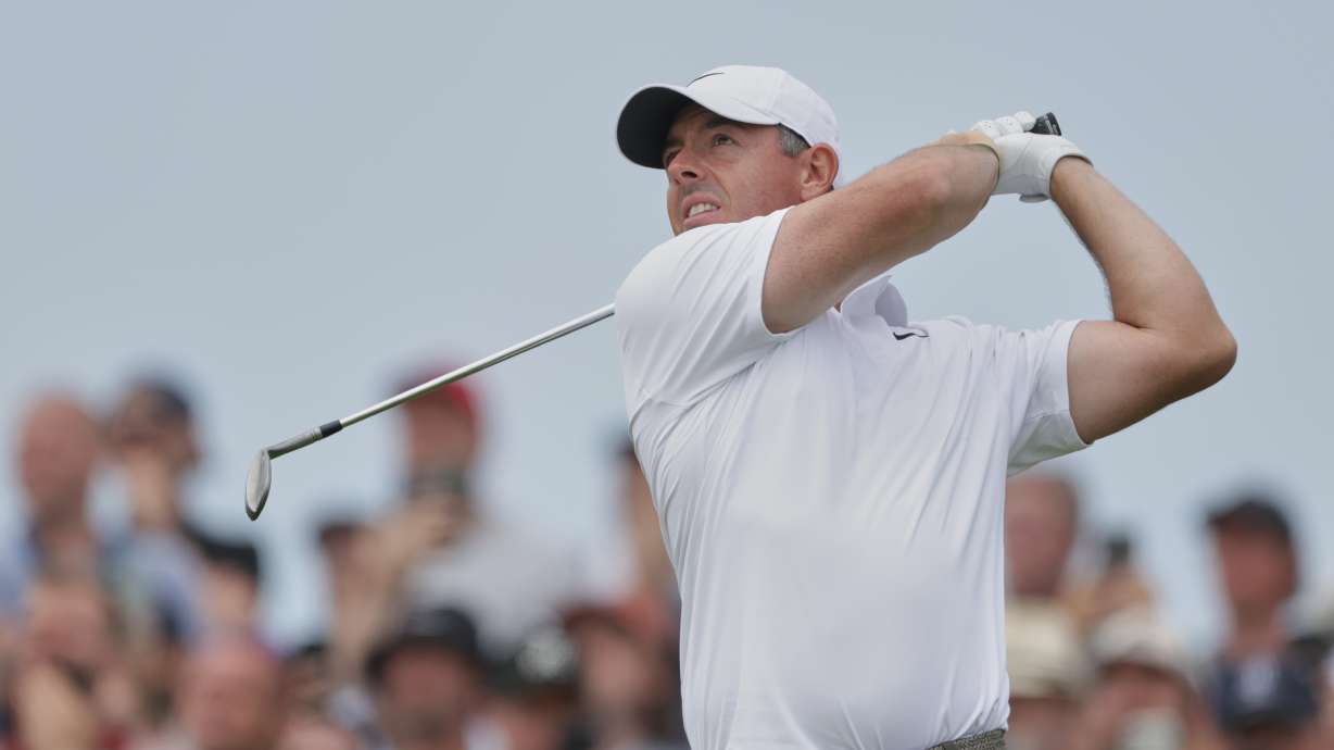 Rory McIlroy of Northern Ireland plays his tee shot on the 7th hole during the third day of the British Open Golf championships at Royal Birkdale golf club, in Southport, England, Saturday, July 18, 2026.