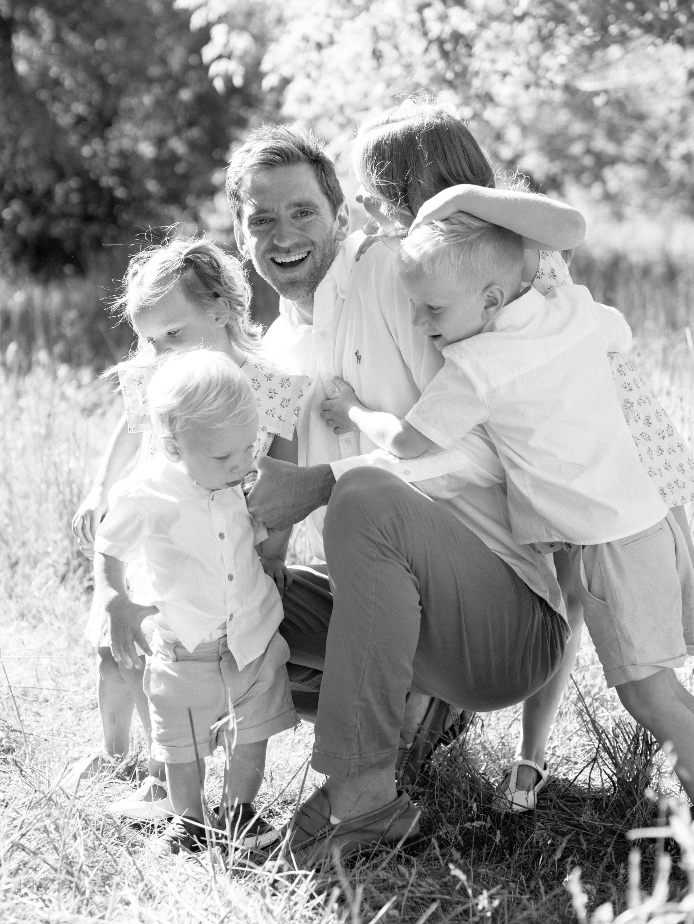 Ben Wilson with his four kids. The Wilson family is hoping to give back after they received overwhelming community support for Ben Wilson's cancer treatment.