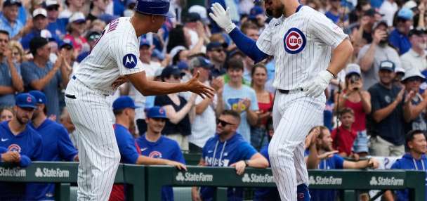 Former Cubs player Anthony Rizzo snares Michael Busch's home run ball in the Wrigley Field bleachers
