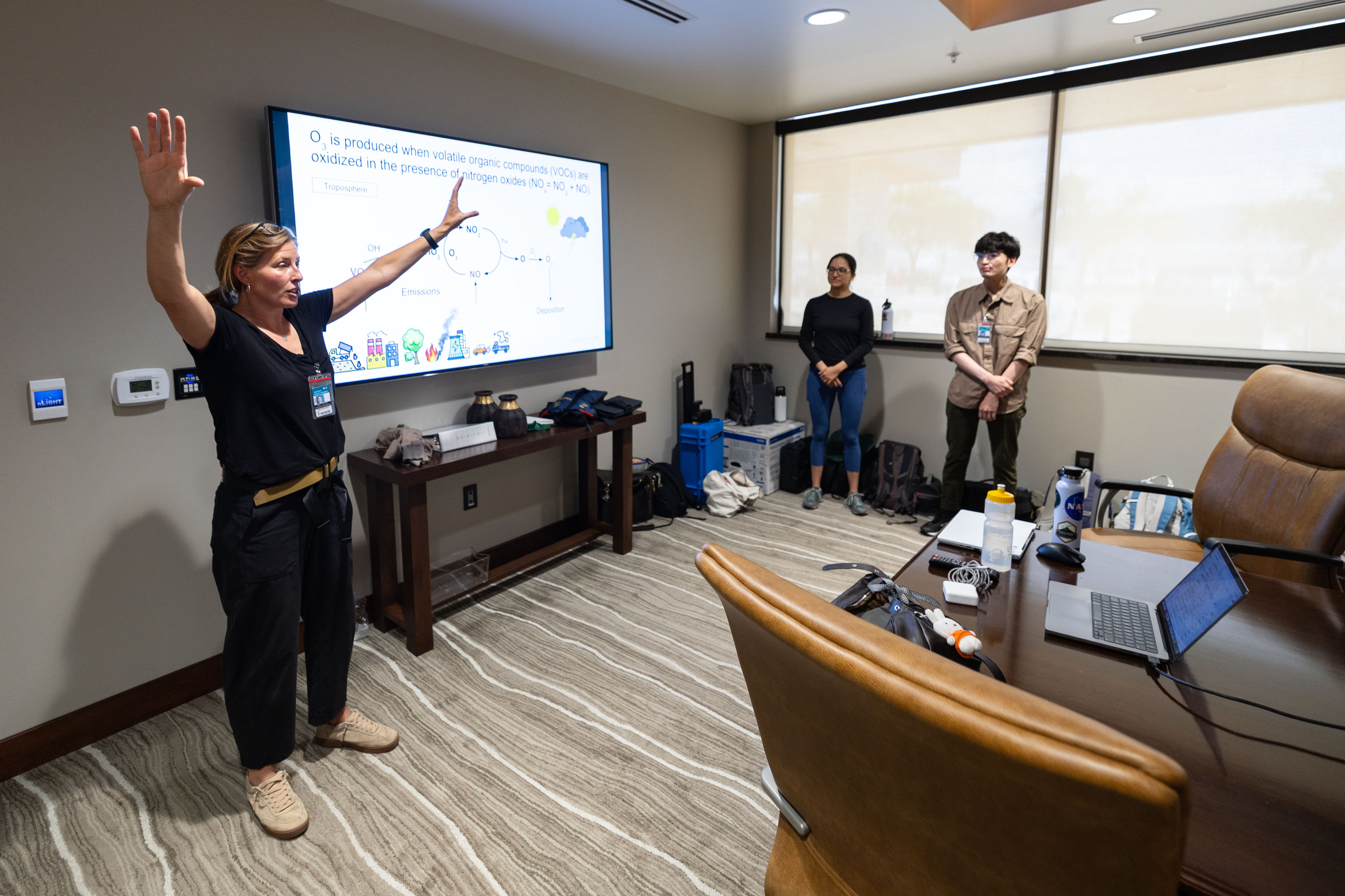 Emily Fischer, a professor at the atmospheric science department at Colorado State University, speaks to a room of students during a tour of the University of Wyoming King Air airborne research aircraft on Friday. Several universities are part of the project to measure summer ozone in the Salt Lake Valley.