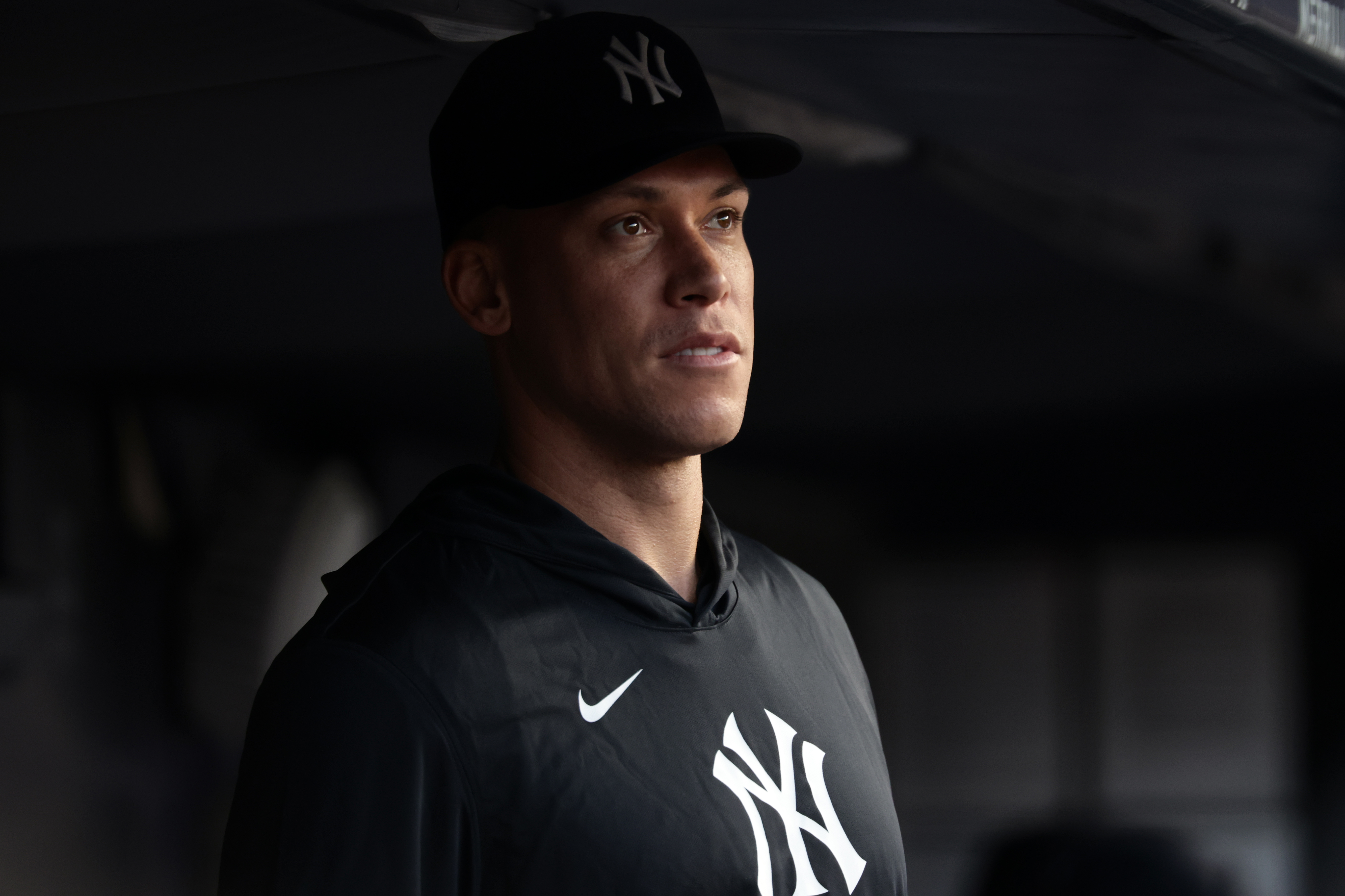 New York Yankees' Aaron Judge looks on from the dugout during the third inning of a baseball game against the Los Angeles Dodgers, Friday, July 17, 2026, in New York. 