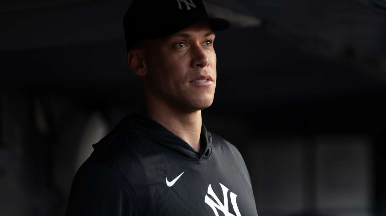 New York Yankees' Aaron Judge looks on from the dugout during the third inning of a baseball game against the Los Angeles Dodgers, Friday, July 17, 2026, in New York.