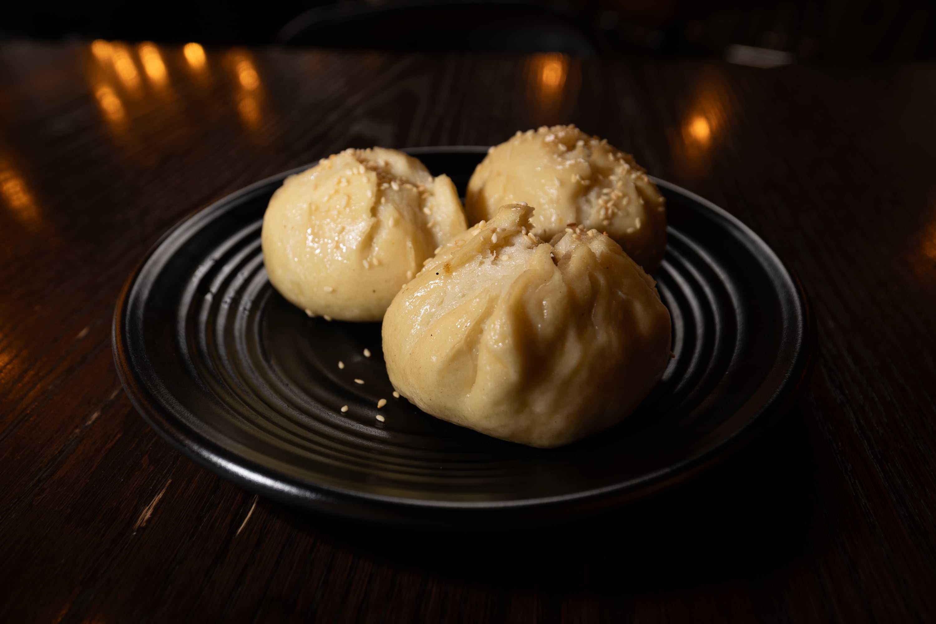 Pan-fried pork puns, a popular appetizer, are displayed at Drunken Kitchen in Salt Lake City on Tuesday.