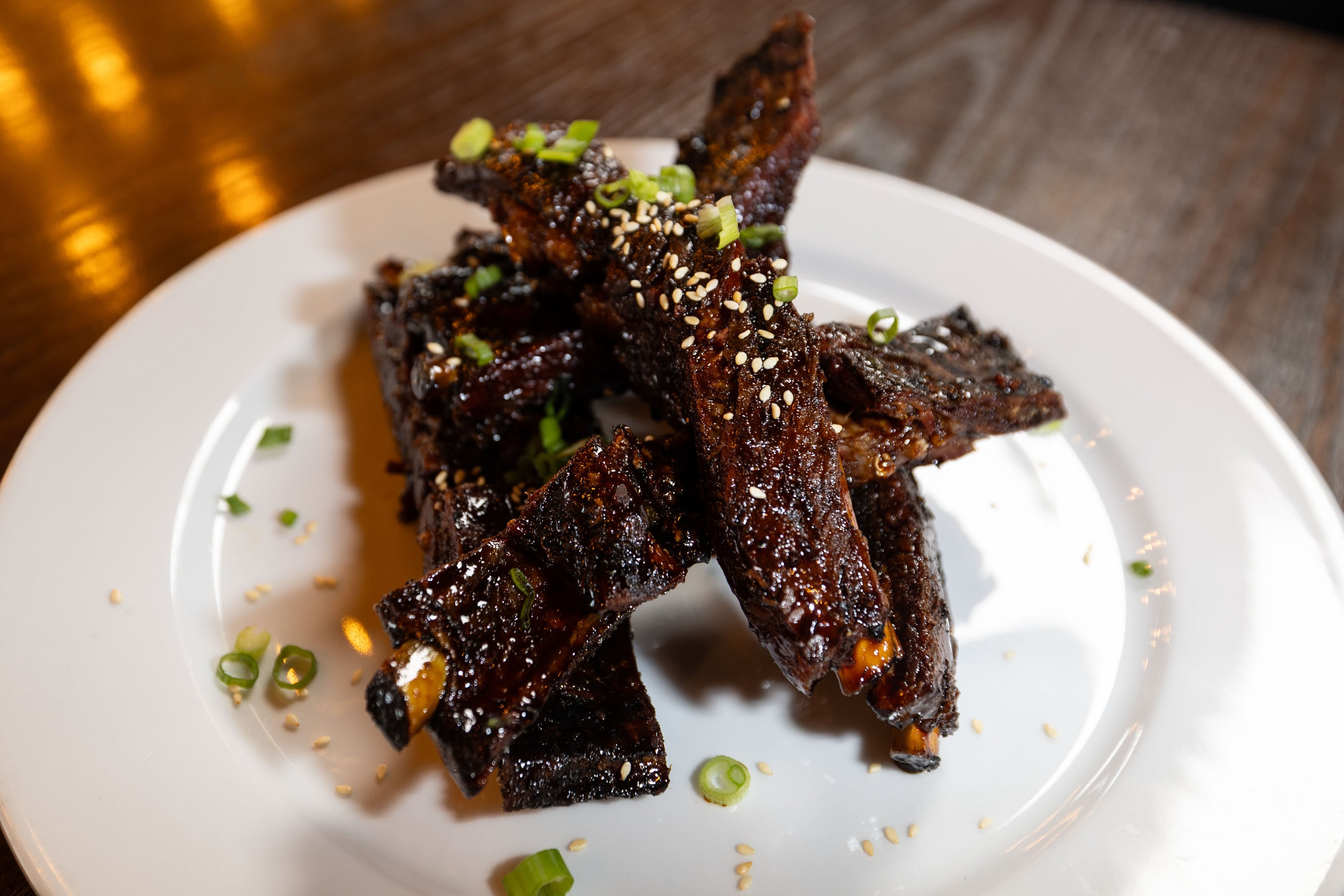 Asian pork sticky ribs are displayed at Drunken Kitchen in Salt Lake City on Tuesday.