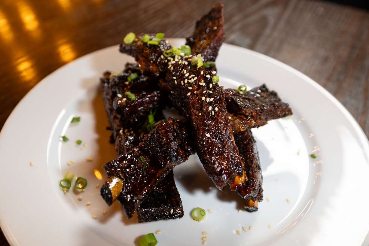 Asian pork sticky ribs are displayed at Drunken Kitchen in Salt Lake City on Tuesday.
