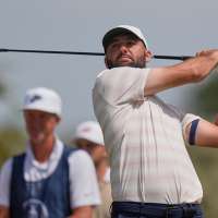 Scottie Scheffler gets bad bounces and a big break. It adds to a close call at British Open