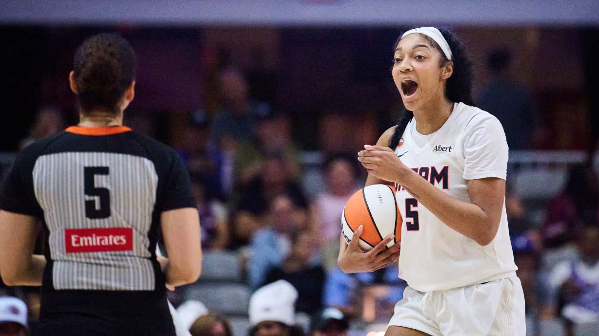 Atlanta Dream's Angel Reese, right, reacts to a foul being called against her during the second half of a WNBA basketball game against the Toronto Tempo in Toronto, Friday, July 17, 2026.