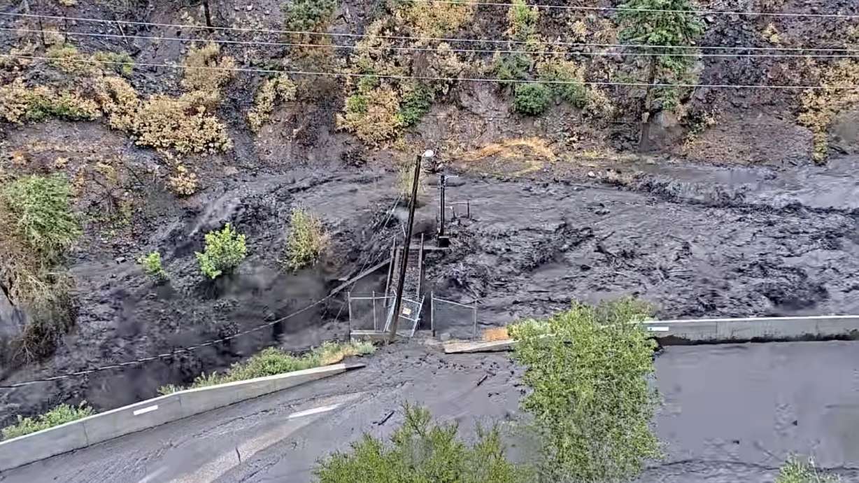 Screenshot taken as a diversion dam in Beaver Canyon was overtaken by floodwaters on Sunday.