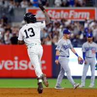 Jazz Chisholm Jr. hits tiebreaking homer in 8th and Yankees beat Dodgers 2-1 to split doubleheader