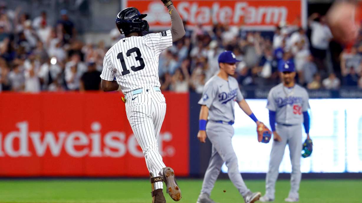 New York Yankees' Jazz Chisholm Jr. reacts running the base after hitting a home run against the Los Angeles Dodgers during the eighth inning of the second game of a baseball doubleheader, Sunday, July 19, 2026 in New York.