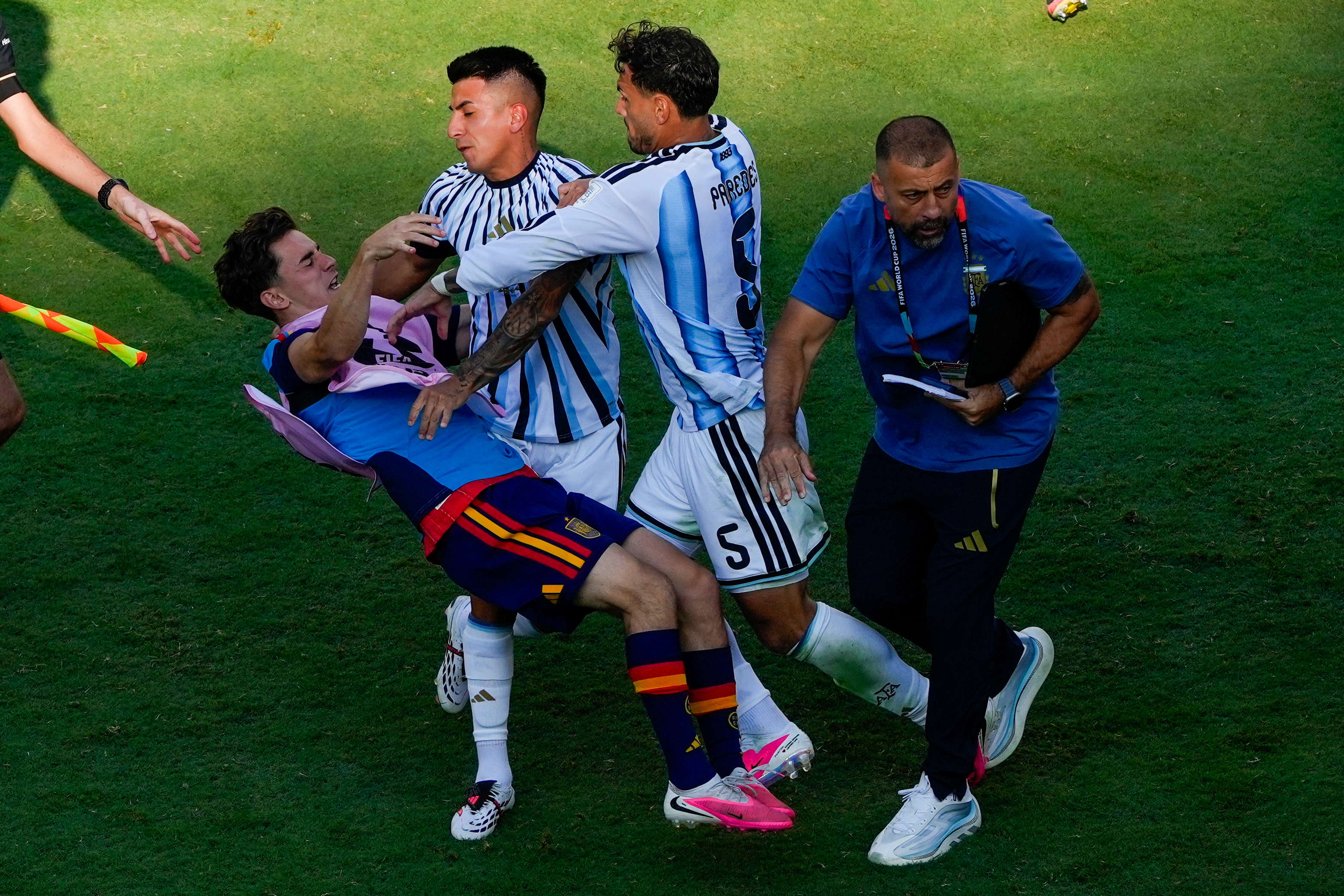 Spain's on-field World Cup celebrations marred by scuffles with Argentina players