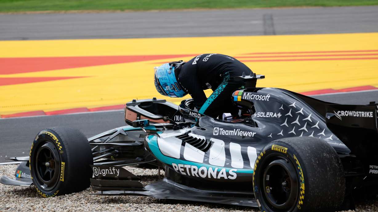Mercedes driver George Russell of Britain gets out of his car after going off the track during the Formula One Grand Prix at the Spa-Francorchamps racetrack in Spa, Belgium, Sunday, July 19, 2026.