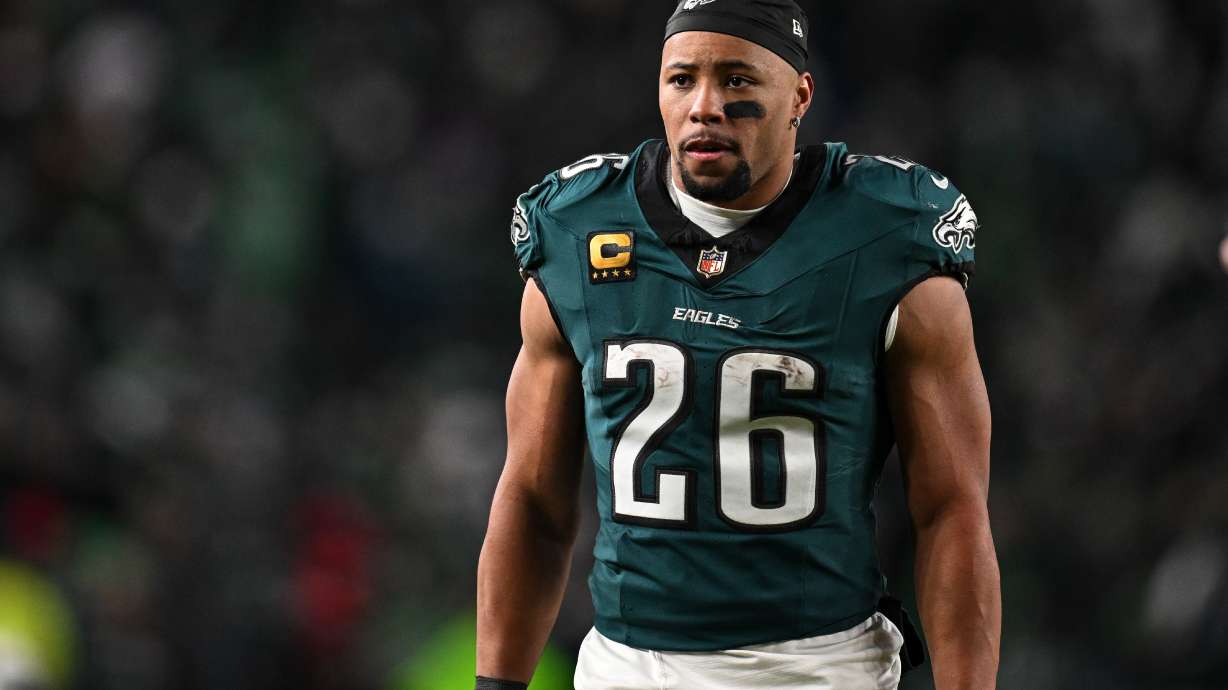 FILE - Philadelphia Eagles running back Saquon Barkley (26) walks off the field during halftime or an NFL wild card playoff football game against the San Francisco 49ers, Sunday, Jan. 11, 2026, in Philadelphia.