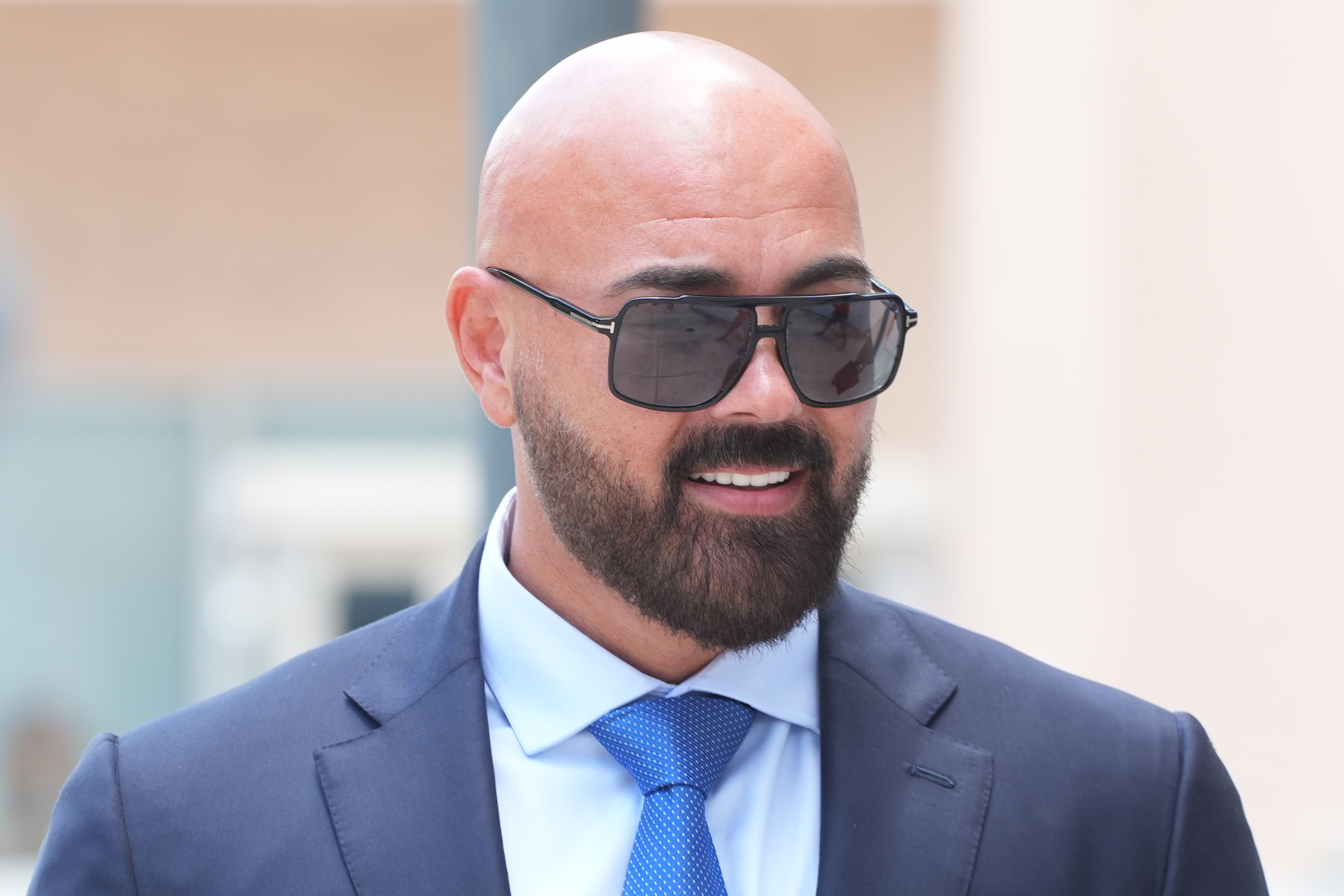 Attorney Joseph McBride arrives for a court hearing for his clients Andrew and Tristan Tate after they were arrested to face rape and sex trafficking charges against them in the United Kingdom, Monday in Miami.