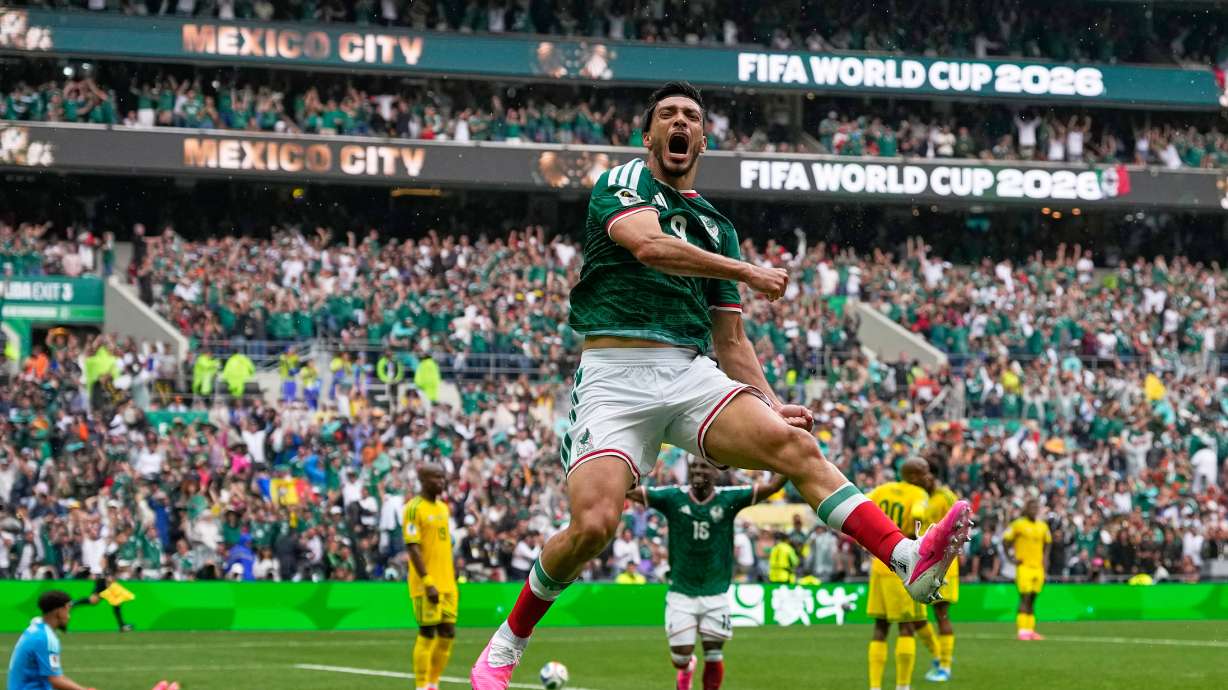 Mexico's Raul Jimenez celebrates after scoring his side's second goal during the World Cup Group A soccer match between Mexico and South Africa in Mexico City, Thursday, June 11, 2026.