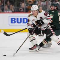 Bedard says Carlsson's offer sheet had no effect on his thinking for Blackhawks contract