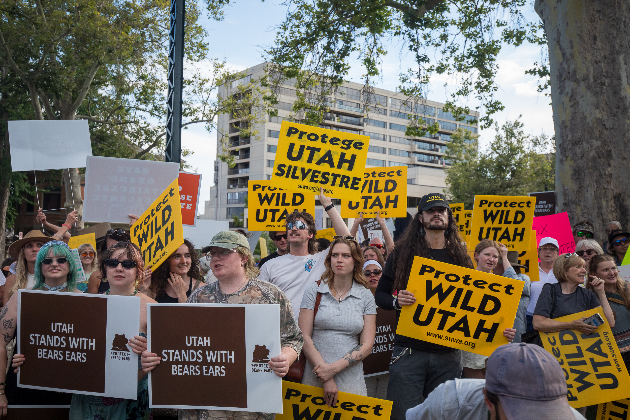 People hold signs and chant during a protest about the reduction of Bears Ears and Grand Staircase-Escalante national monuments outside of the Utah Governor's Mansion in Salt Lake City on Monday.