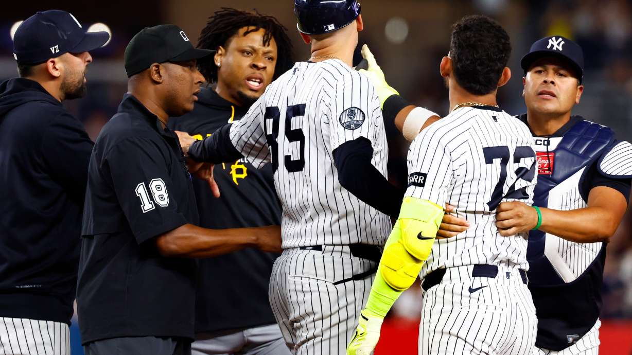 Pittsburgh Pirates' Gregory Soto, left, exchanges words with New York Yankees' José Caballero (72), right, during the ninth inning of a baseball game, Monday, July 20, 2026 in New York.