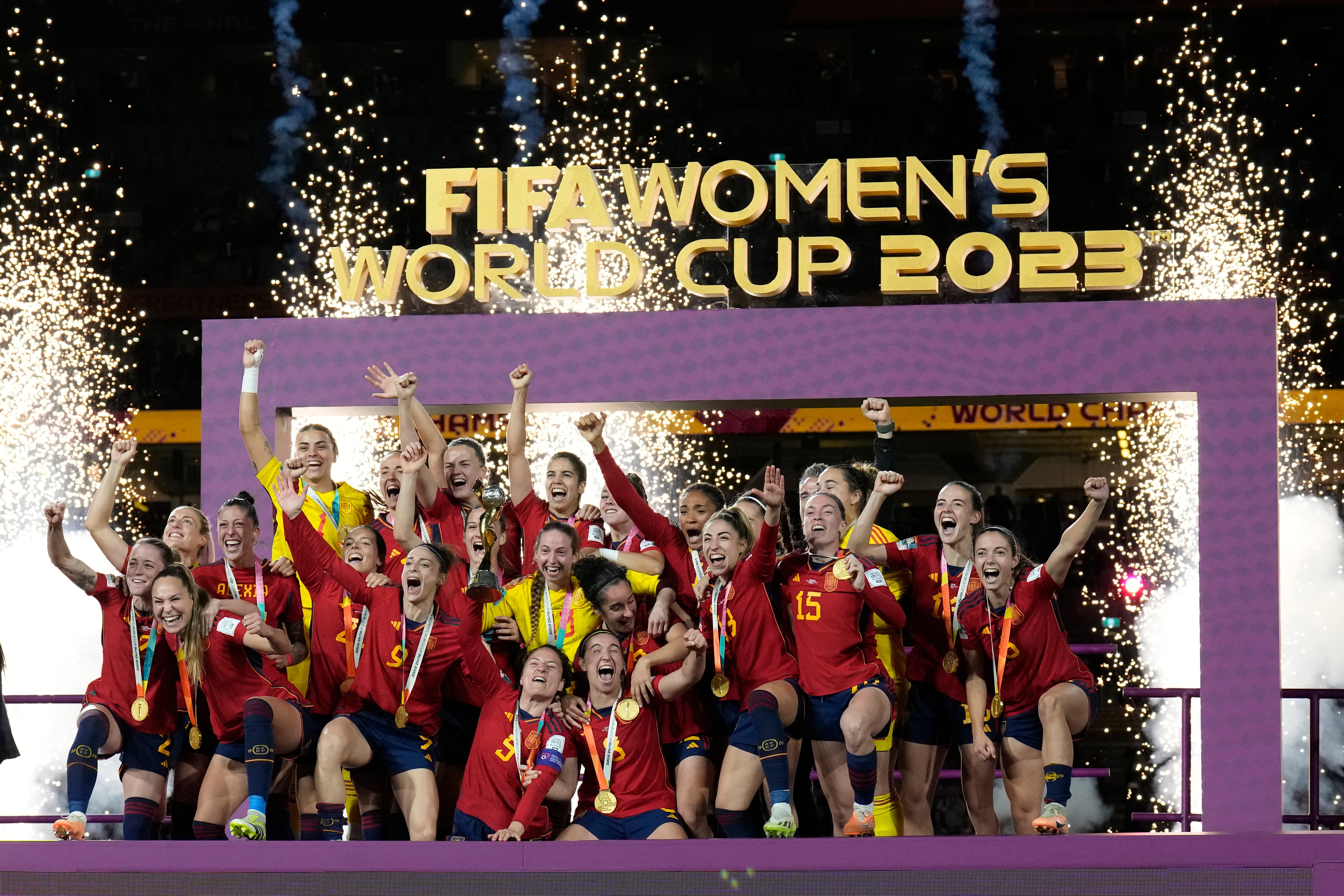 FILE - Team Spain celebrates with the trophy after winning the Women's World Cup soccer final against England at Stadium Australia in Sydney, Australia, August 20, 2023.