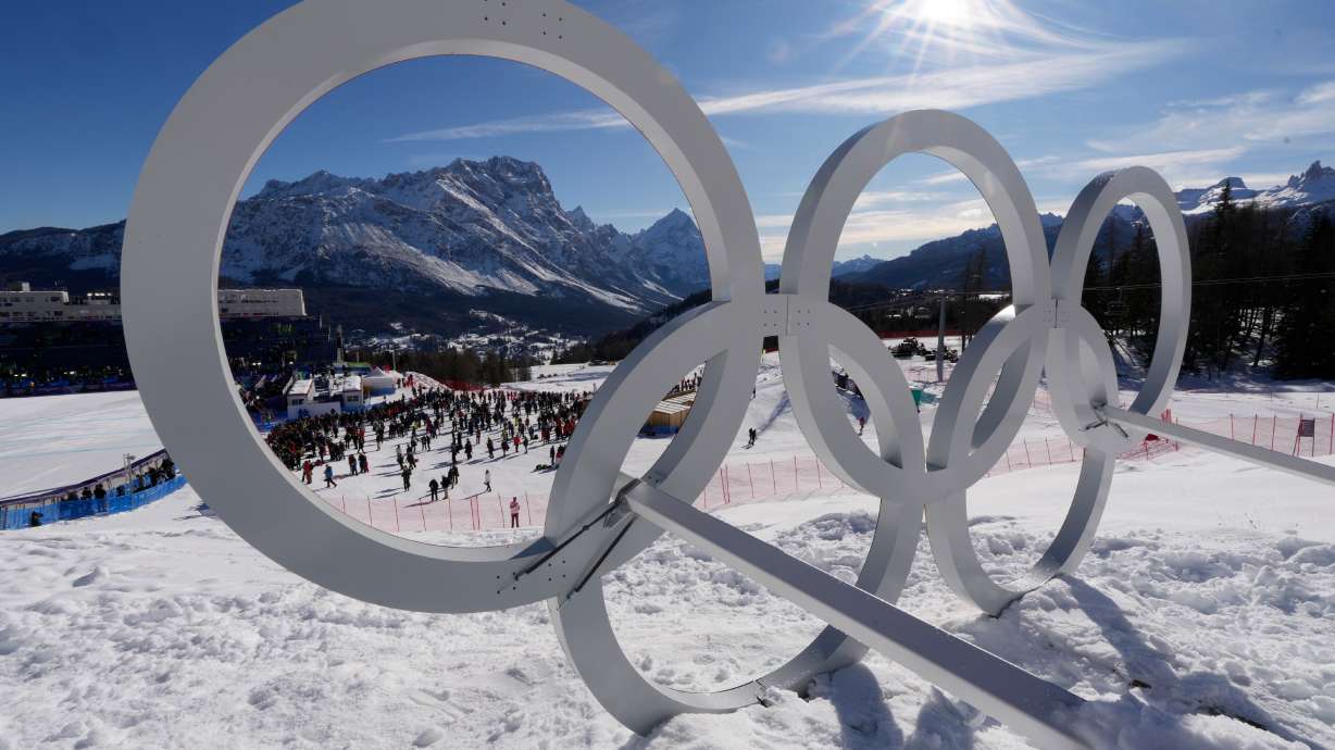 FILE - Olympic rings are seen at the 2026 Winter Olympics in Cortina d'Ampezzo, Italy, Feb. 8, 2026.