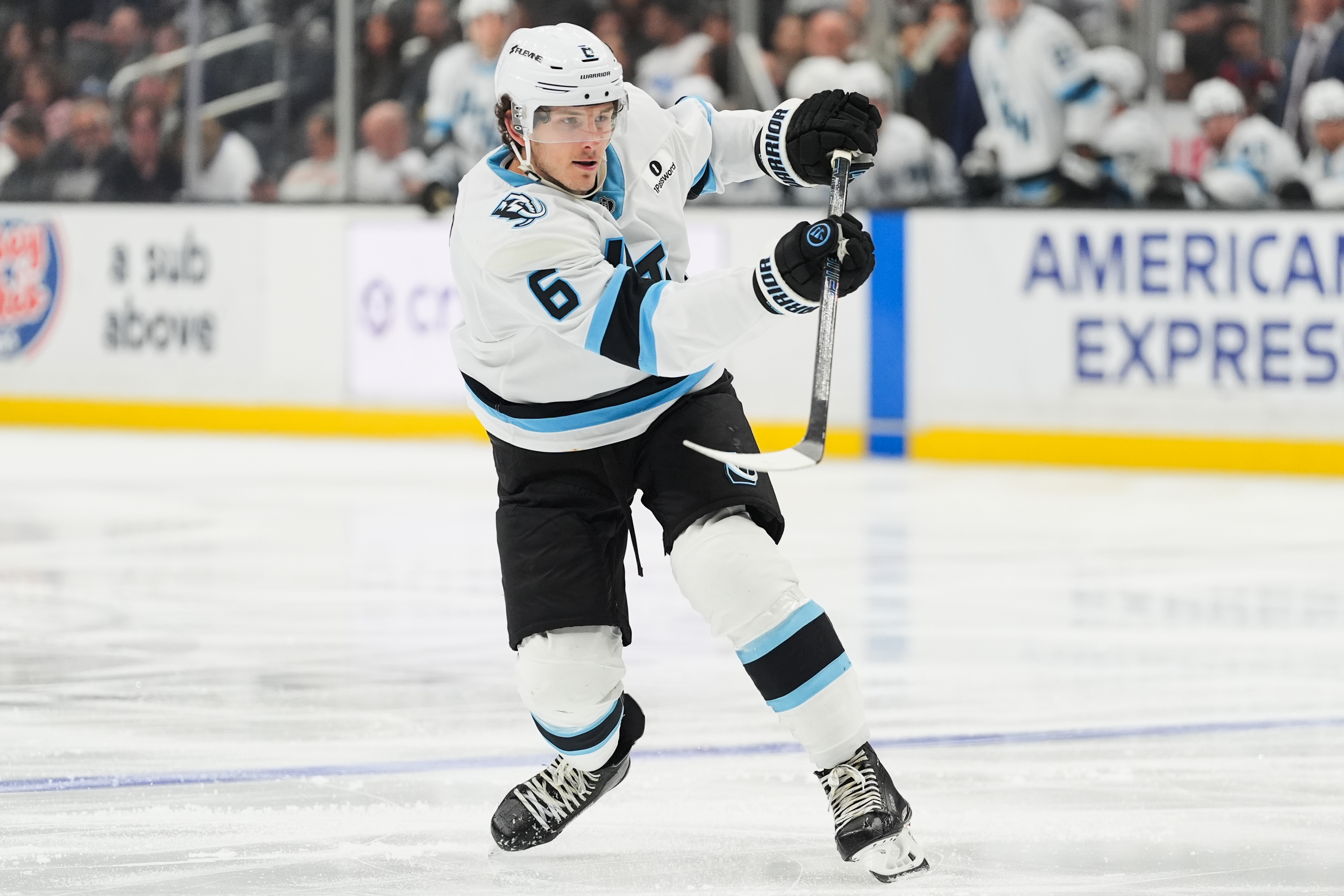 FILE - Utah Mammoth defenseman John Marino (6) hits the puck during the third period of an NHL hockey game against the Los Angeles Kings, March 28, 2026, in Los Angeles. 