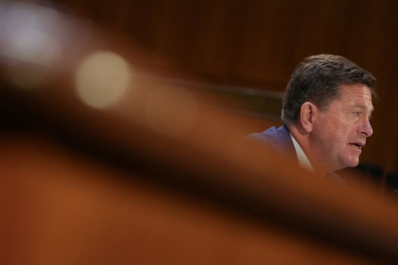 US Senate panel narrowly backs Trump nominee to be top US spy
