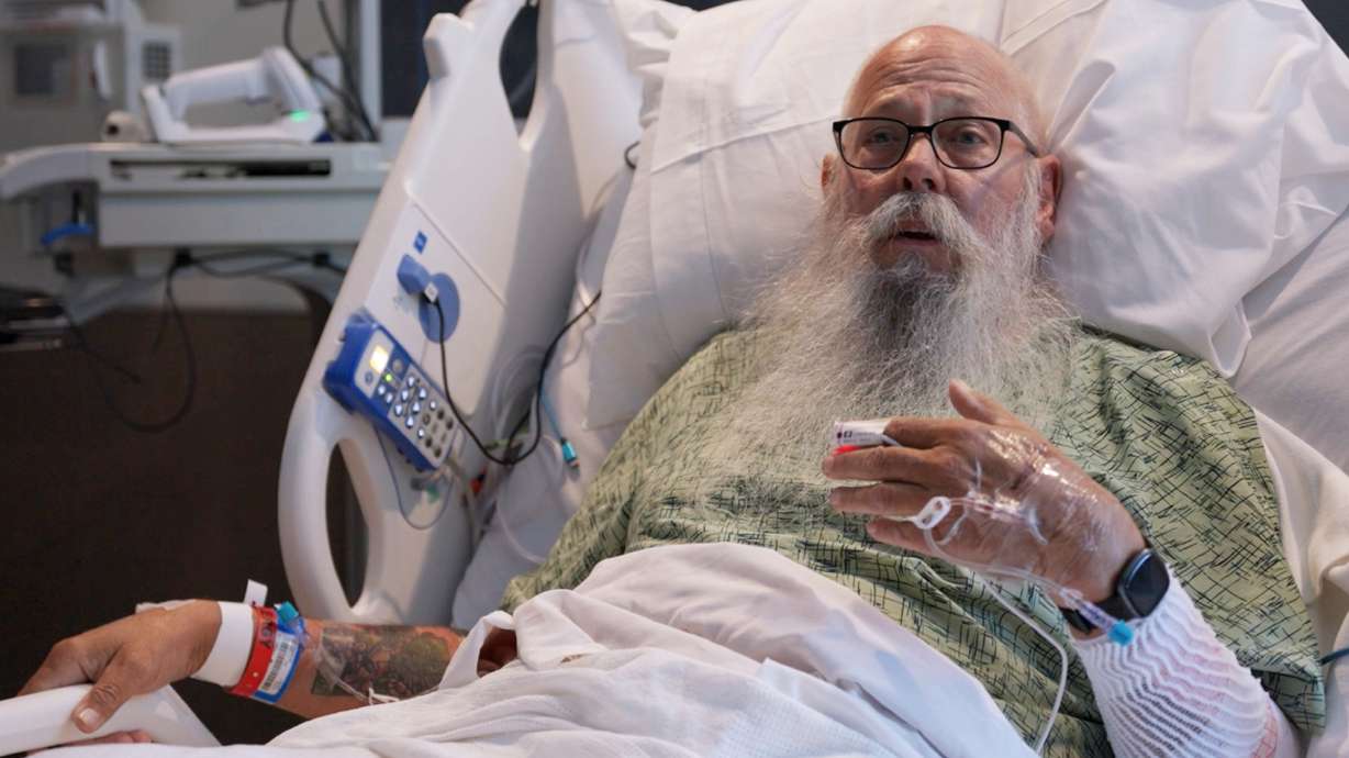 This image taken from Bozeman Health video shows Carl McDaniel speaking from in a hospital bed at Bozeman Health on July 13, in Bozeman, Mont., after he was hit by a bison in Yellowstone National Park.