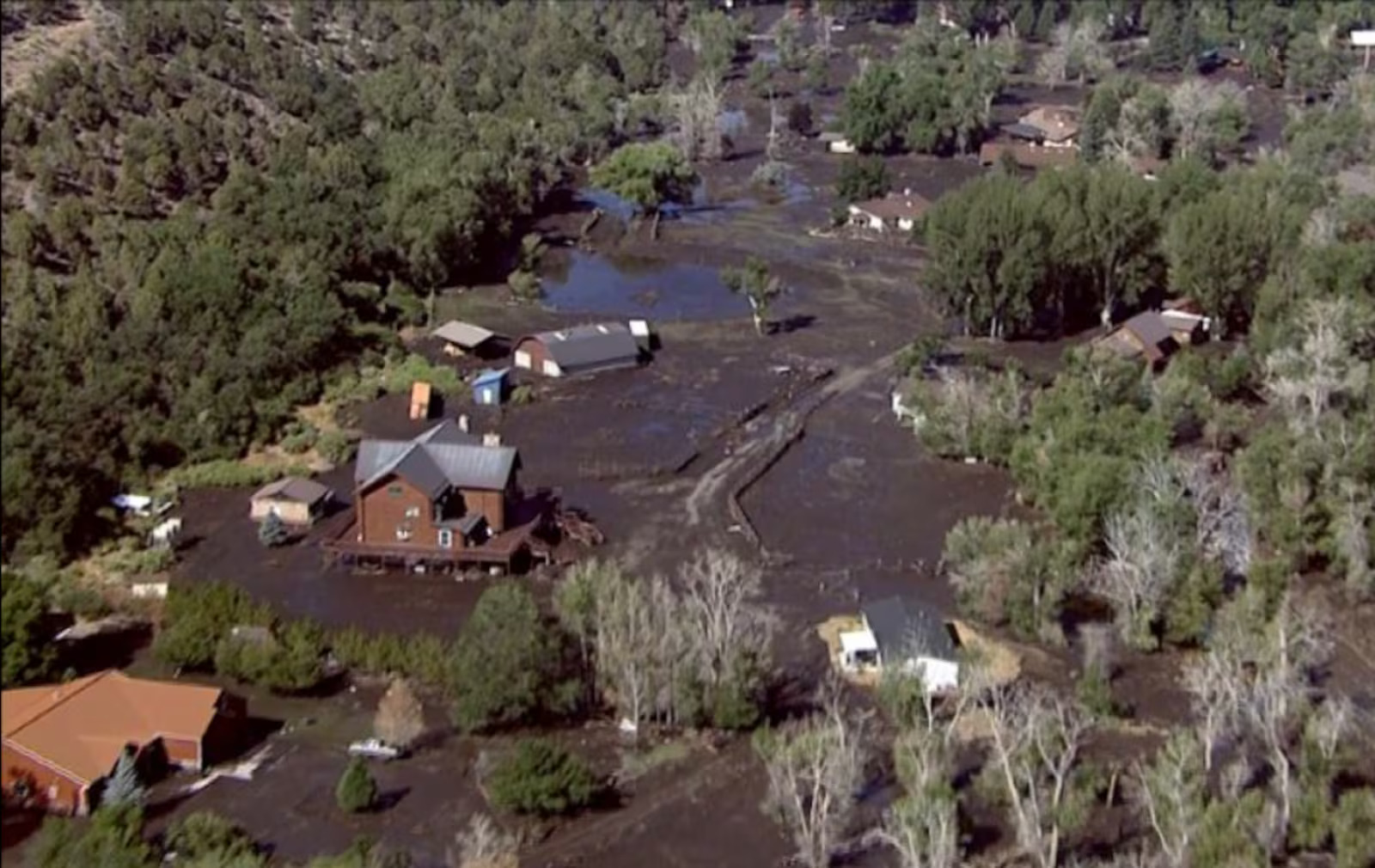 Mud surrounds houses in Beaver on Monday.