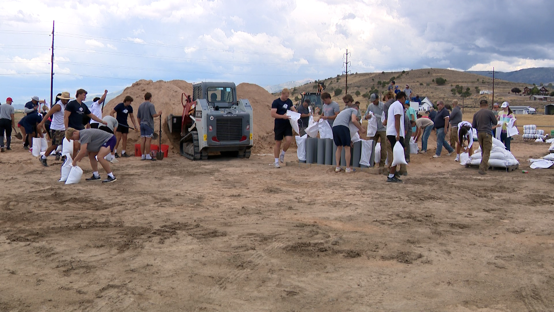 In the midst of Beaver County officials on Tuesday declaring a state of emergency in response to wildfires and flooding, Utah Tech University's athletics department felt compelled to lend not just a hand, but the hands of around 40 student-athletes.