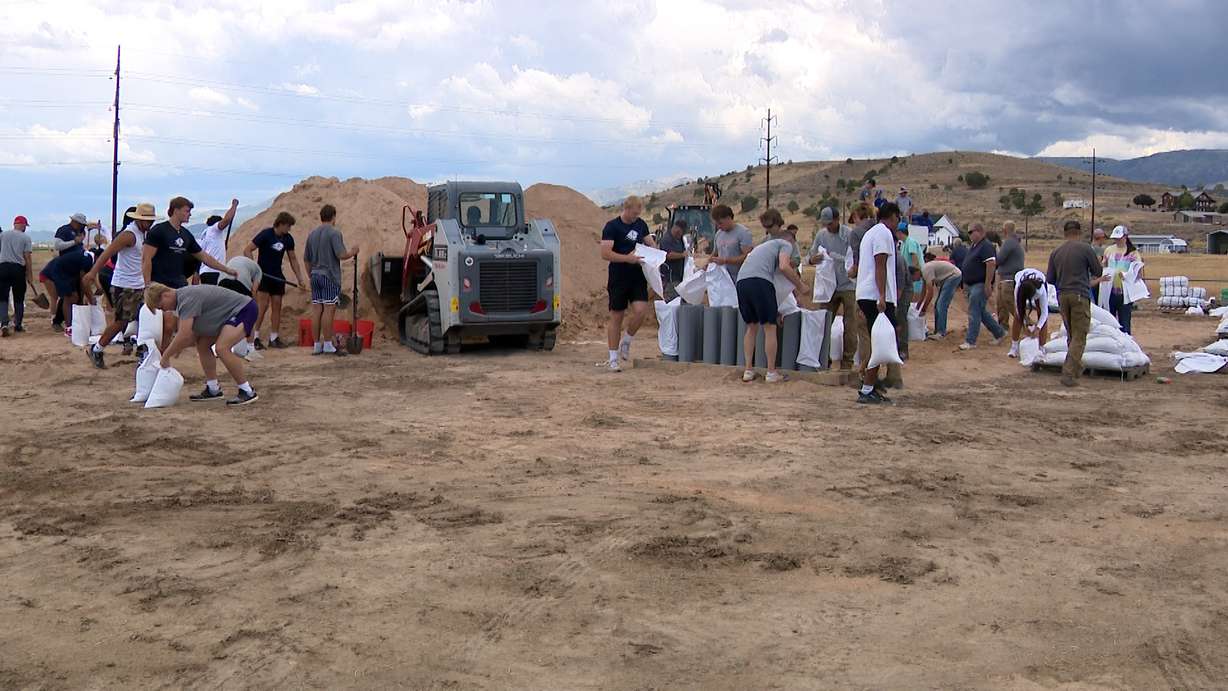 In the midst of Beaver County officials on Tuesday declaring a state of emergency in response to wildfires and flooding, Utah Tech University's athletics department felt compelled to lend not just a hand, but the hands of around 40 student-athletes.